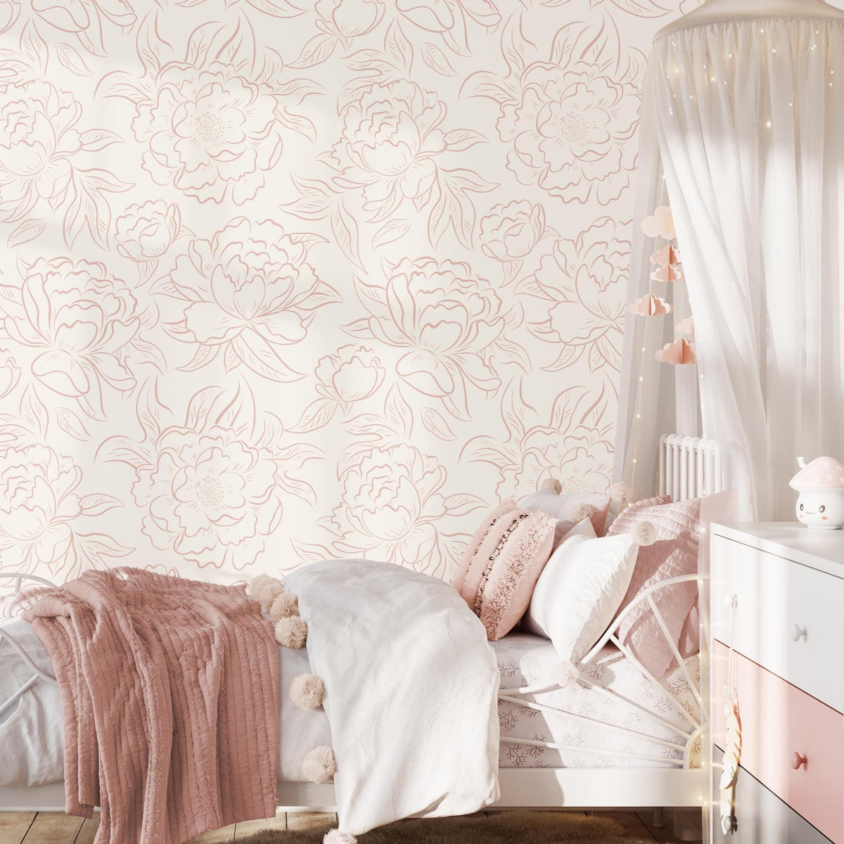 Girls' bedroom with pink bedding against blush pink Peony Sketch floral wallpaper