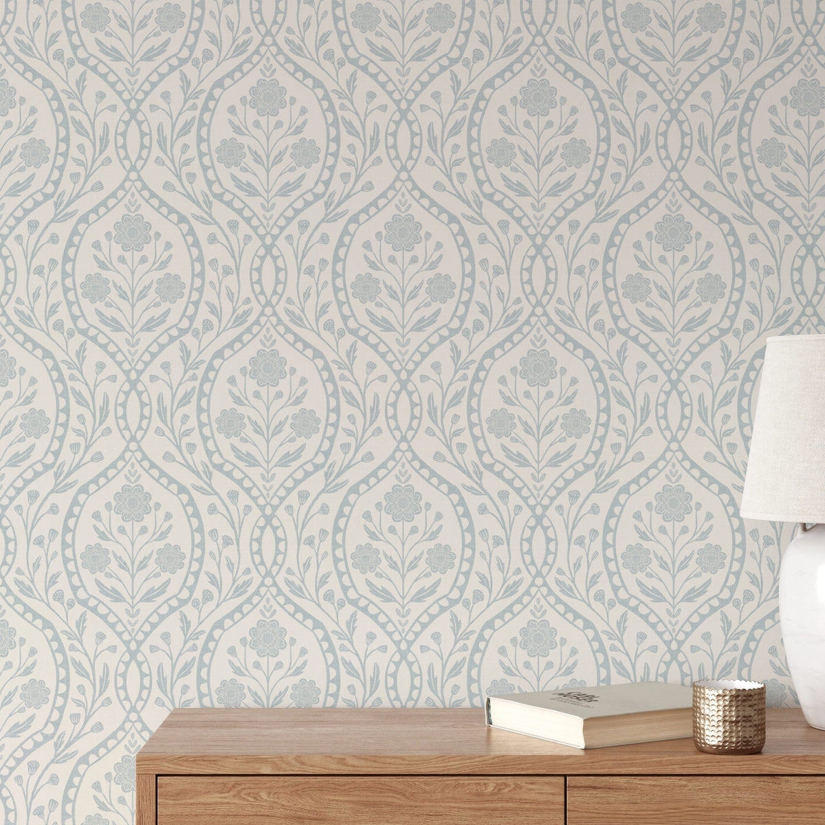 Light blue French country wallpaper with elegant wildflowers on an off-white background. Renter-friendly design for nursery, bedroom, or bathroom wall.