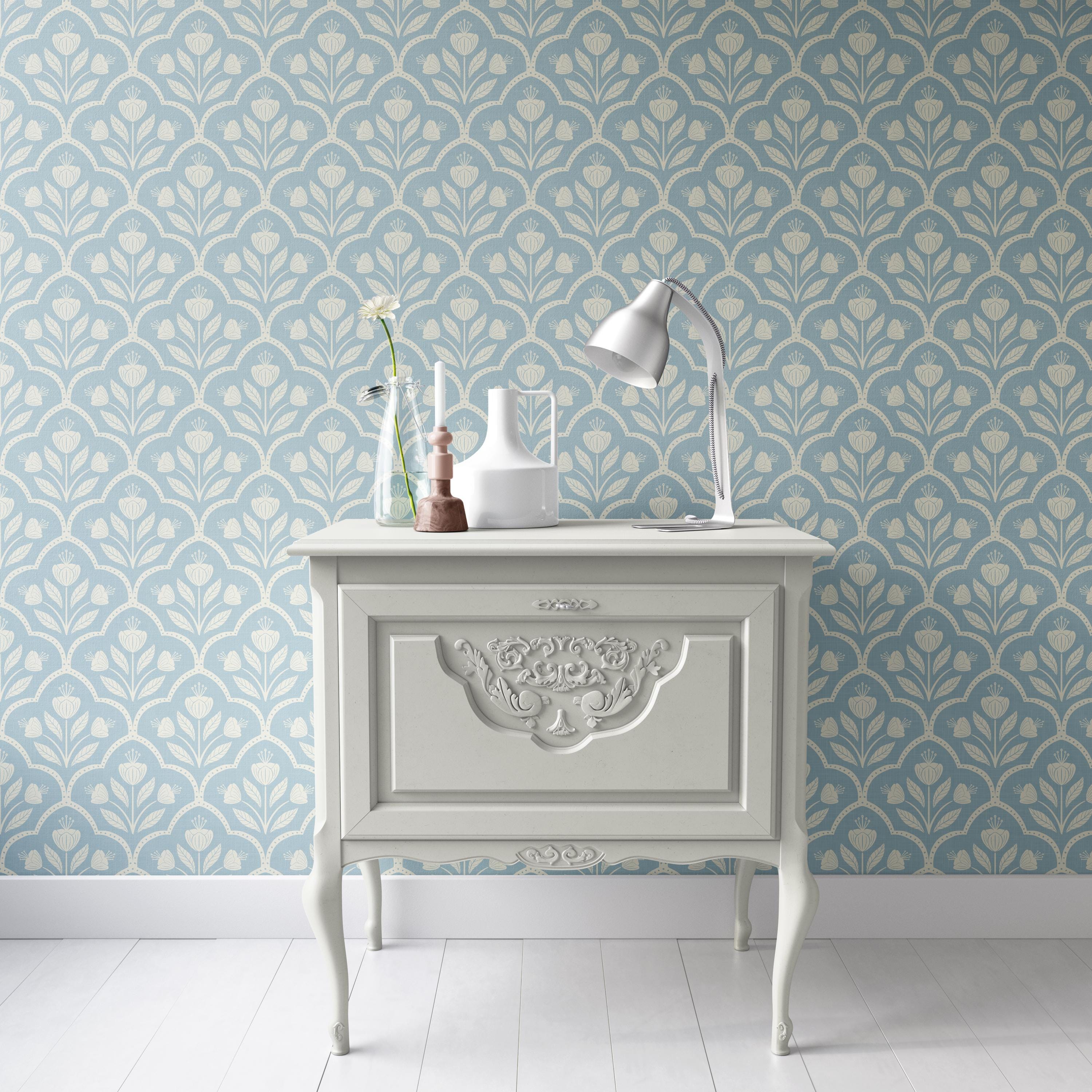 Wallpaper Removable in peel and stick or Pre-Pasted. A light blue pastel Cottagecore Wildflower Floral for Baby Nursery, Bathroom, Laundry Room Accent wall. Features a repeating medallion print with flowers inside for a vintage or tiled appearance.