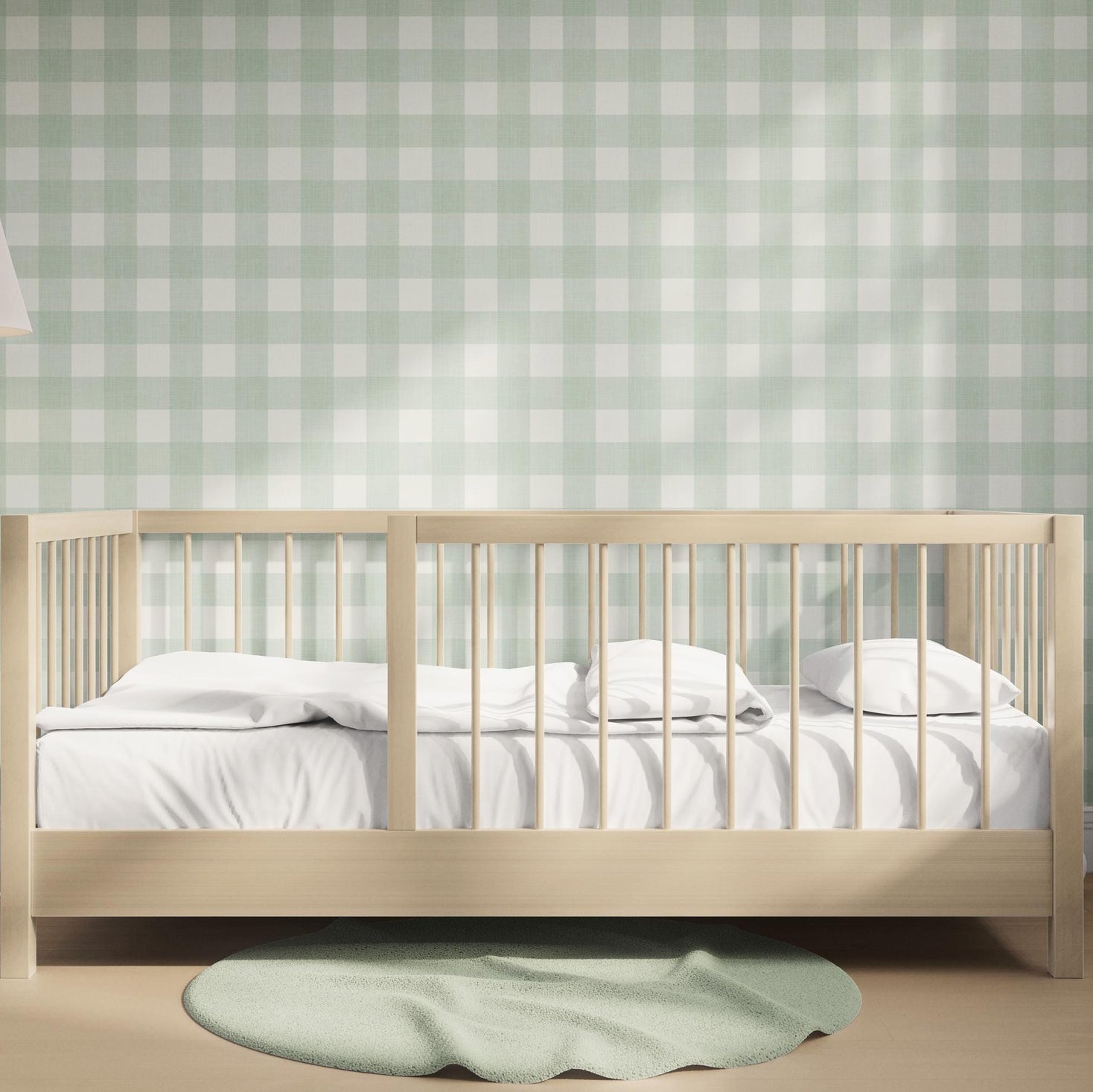 Gingham Wallpaper Sage Green Buffalo Check Plaid Peel and Stick Removable Renter Friendly Wallpaper shown on accent wall in baby toddler room with a neutral earth tone gender neutral feel.
