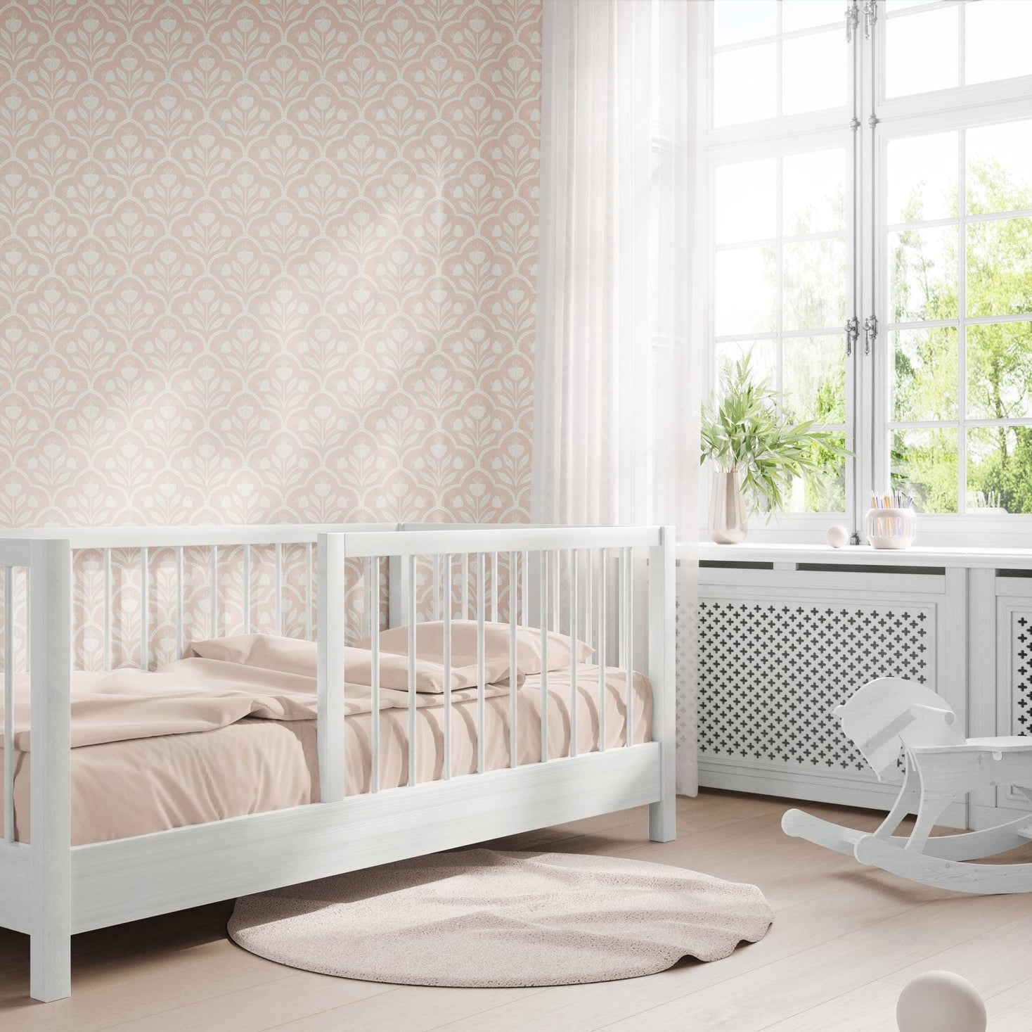 Pastel pink floral wallpaper with a repeating wildflower pattern in a soft coquette style, ideal for baby girl nurseries, tween rooms, or romantic accent walls. featured on baby toddler nursery wall