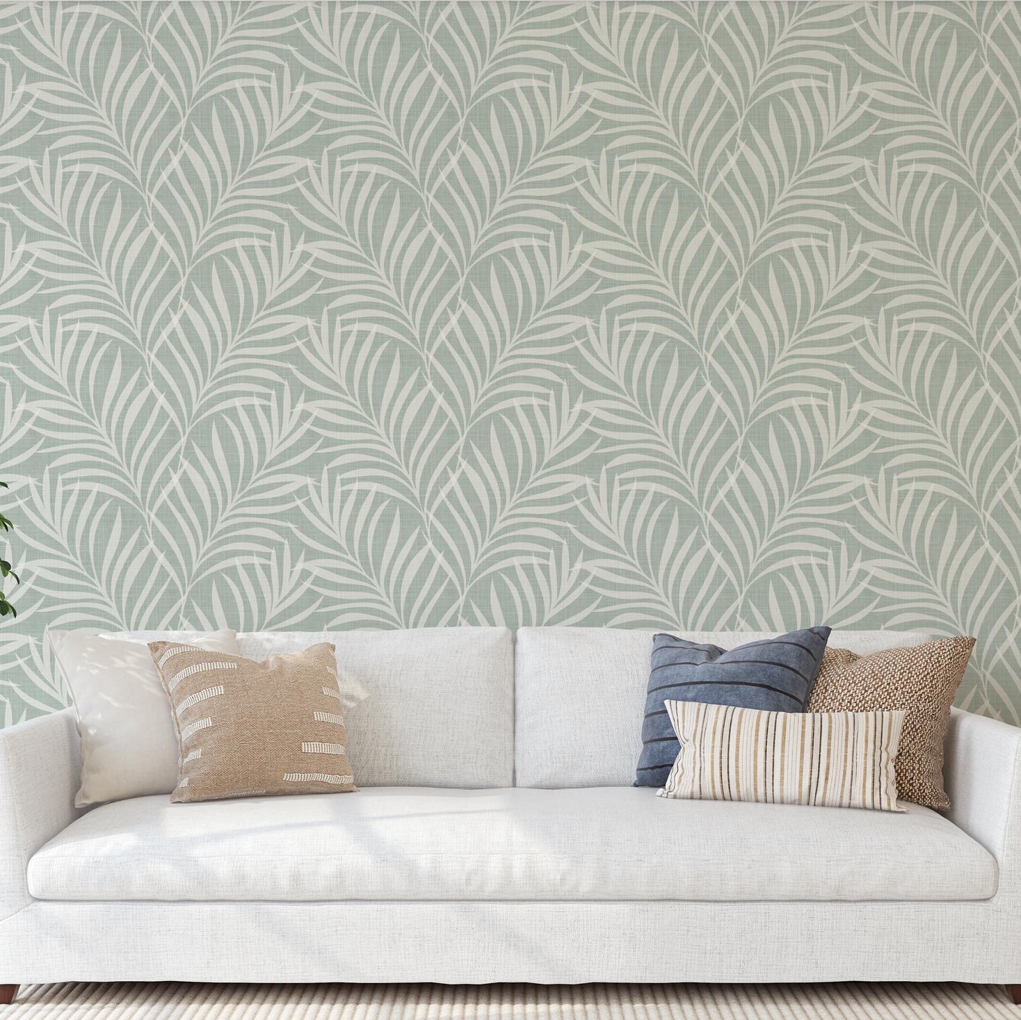 sage green palm leaf wallpaper with a coastal boho botanical style, perfect for nursery, bathroom, or bedroom walls. Available in peel and stick, prepasted, and sample options.