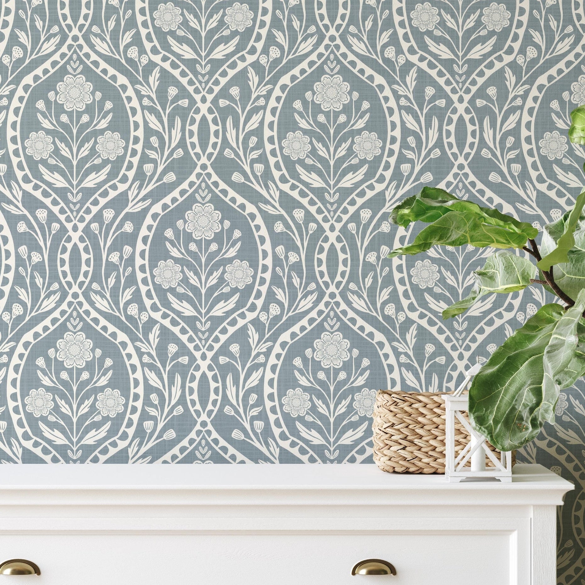 blue and white floral wallpaper with a wildflower floral damask pattern. Shown in peel and stick or prepasted for a removable renter friendly option for traditional or french country aesthetic suitable for baby nursery, bedroom, bathroom, kitchen or dining room.