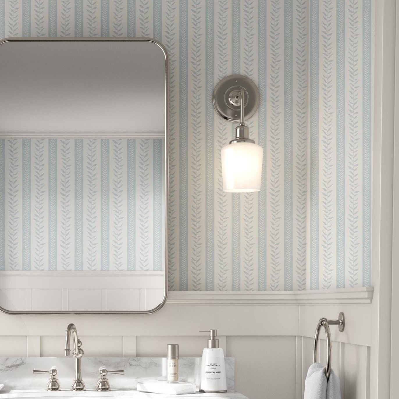 modern coastal wallpaper with tropical botanical stripe in light blue and white for baby boy nursery, bedroom, bathroom accent wall, or calming beach home inspired spaces. Shown in peel and stick or prepasted removable renter friendly wallpaper.