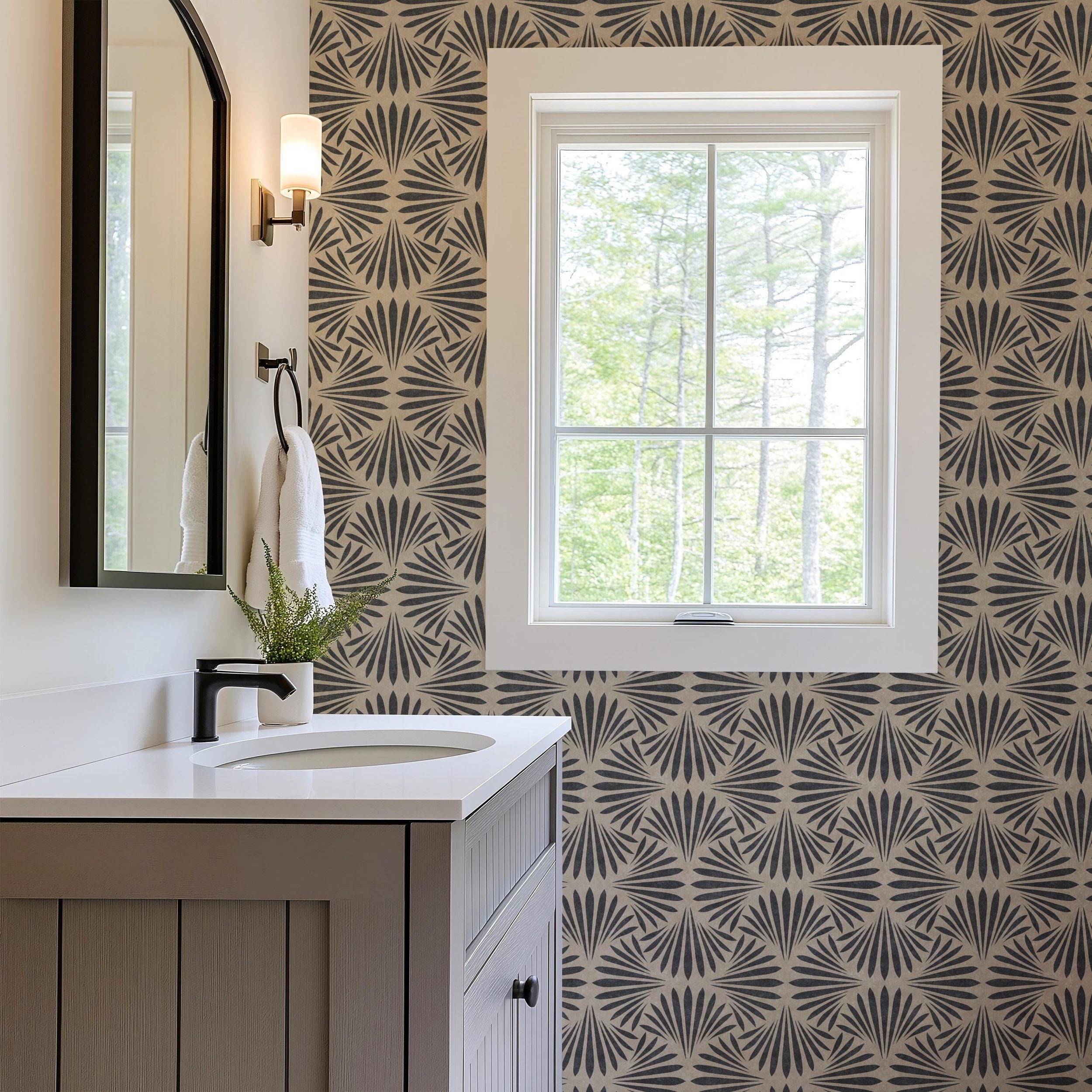 Neutral black and tan art deco moody floral dark botanical wallpaper available in peel and stick and prepasted in a modern tropical boho style with a subtle linen texture, ideal for coastal bedrooms, powder rooms, or Japandi accent walls. featured as bathroom accent wall.