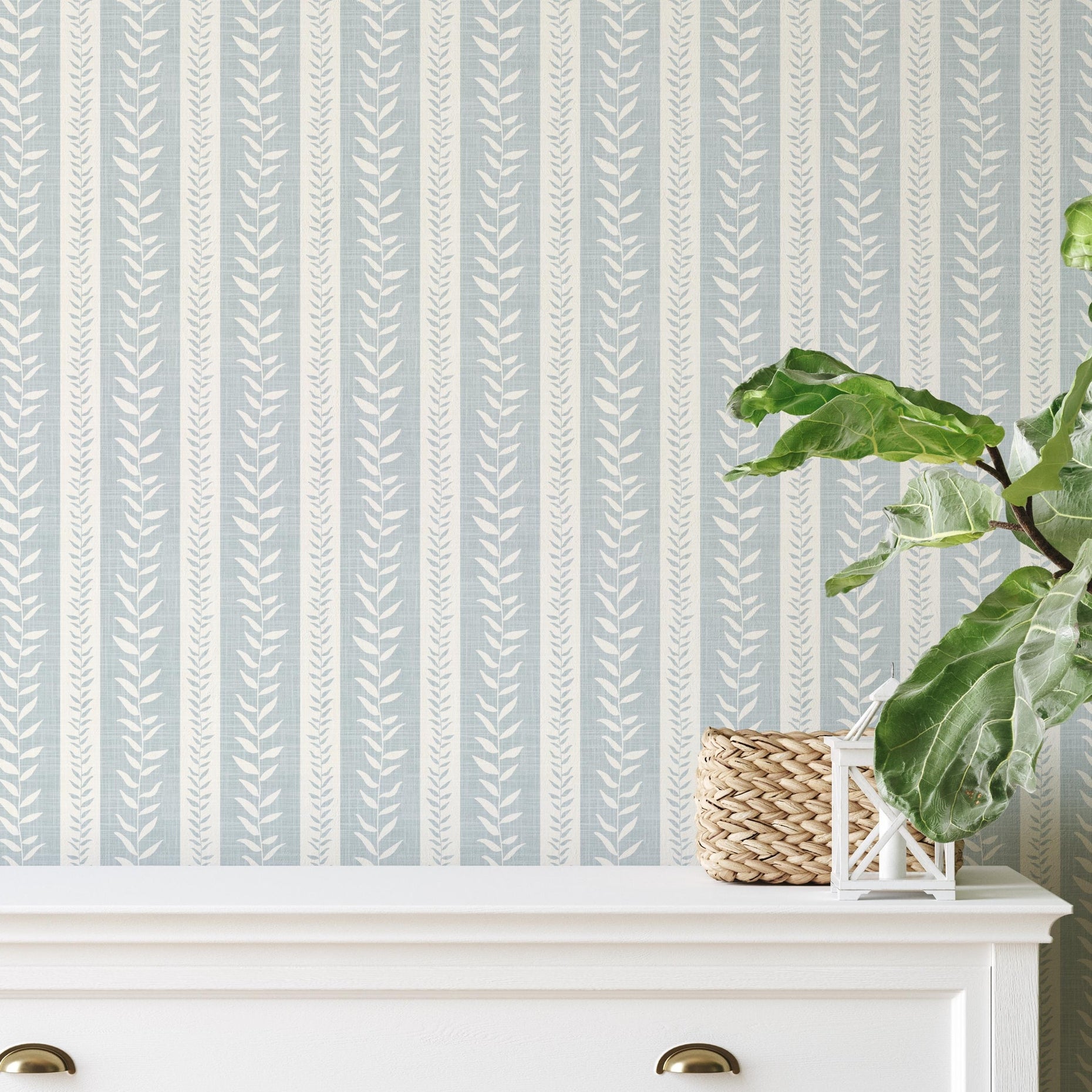 wallpaper peel and stick or prepasted in light blue and white botanical stripe for modern coastal farmhouse and french country interiors. Perfect for bathroom, powder room, or baby nursery accent walls. Light faux linen texture with tropical vine stripe for a timeless look.