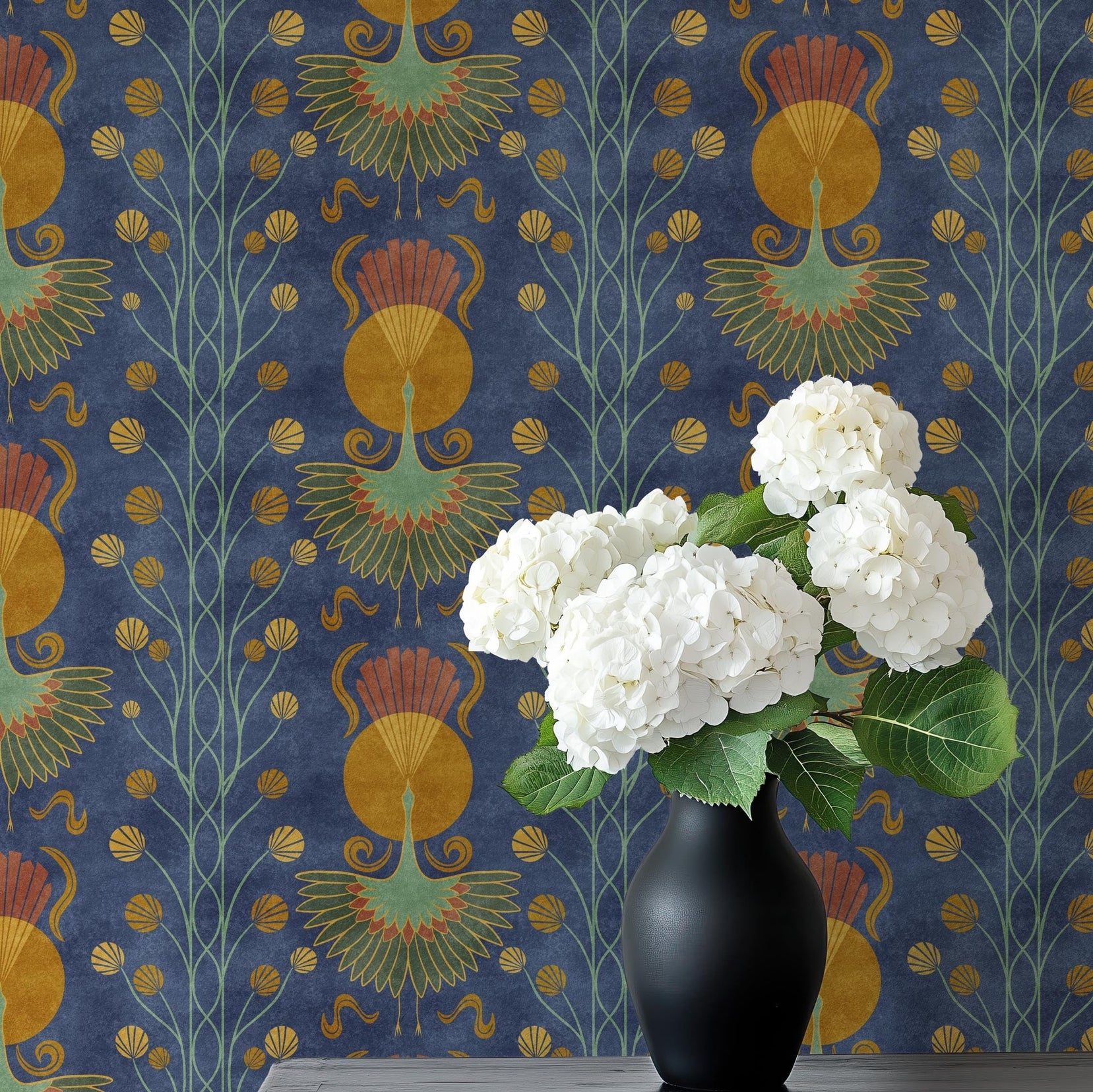 Shown here in peel and stick removable wallpaper. Hand-drawn Art Deco crane design in dark navy blue with moody botanical accents. Available in sample swatches. Ideal for bathroom walls, accent walls, and bedrooms.