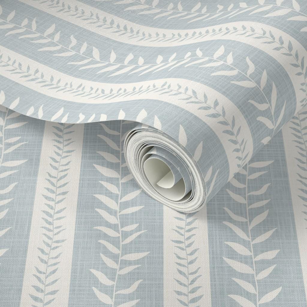 wallpaper peel and stick or prepasted in light blue and white botanical stripe for modern coastal farmhouse and french country interiors. Perfect for bathroom, powder room, or baby nursery accent walls. Light faux linen texture with tropical vine stripe for a timeless look.