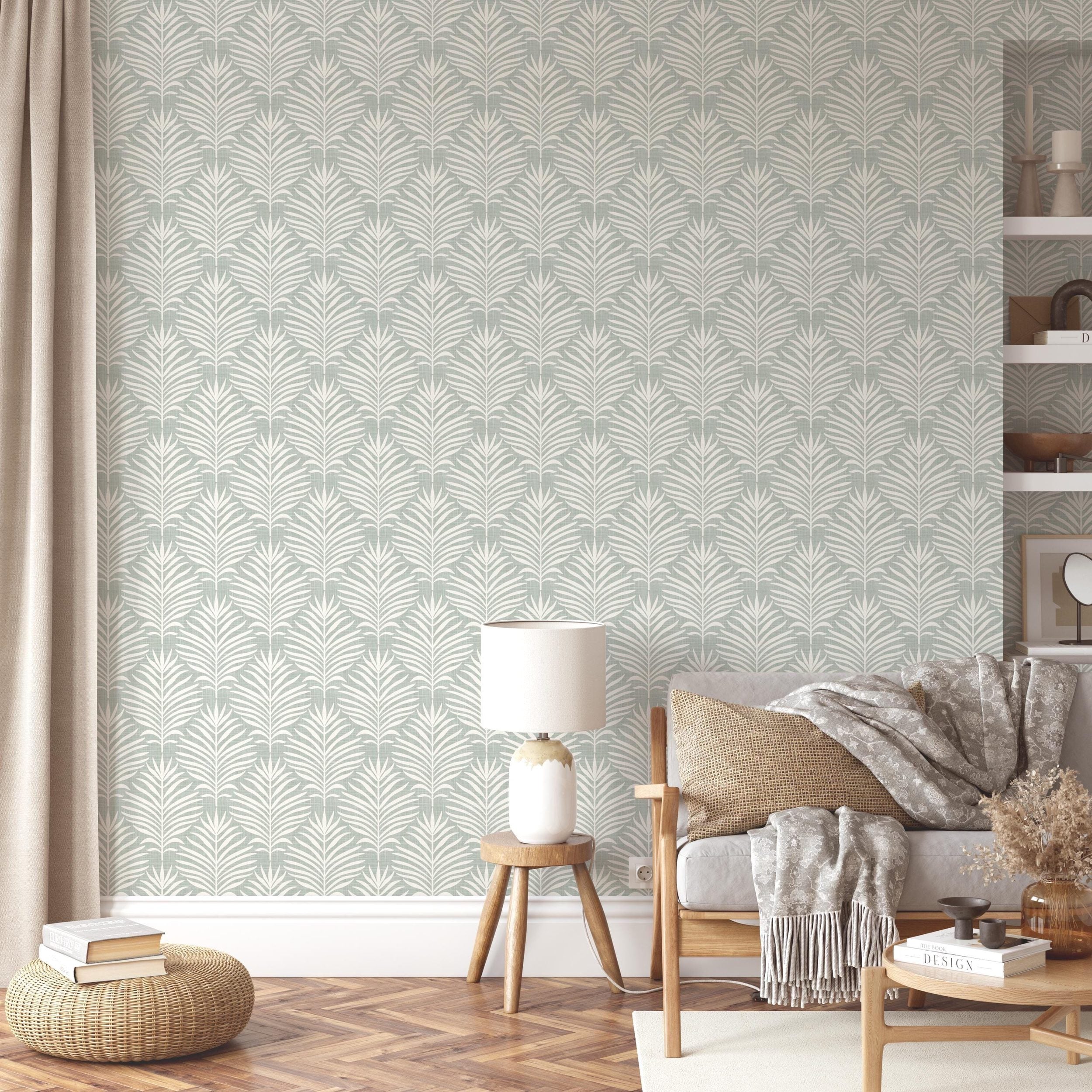 Boho Tropical Peel and Stick Wallpaper shown in peel and stick or pre-pasted. Neutral Blue Green Botanical Palm Leaf perfect for Modern Coastal interiors, baby nursery, bathroom or powder room.