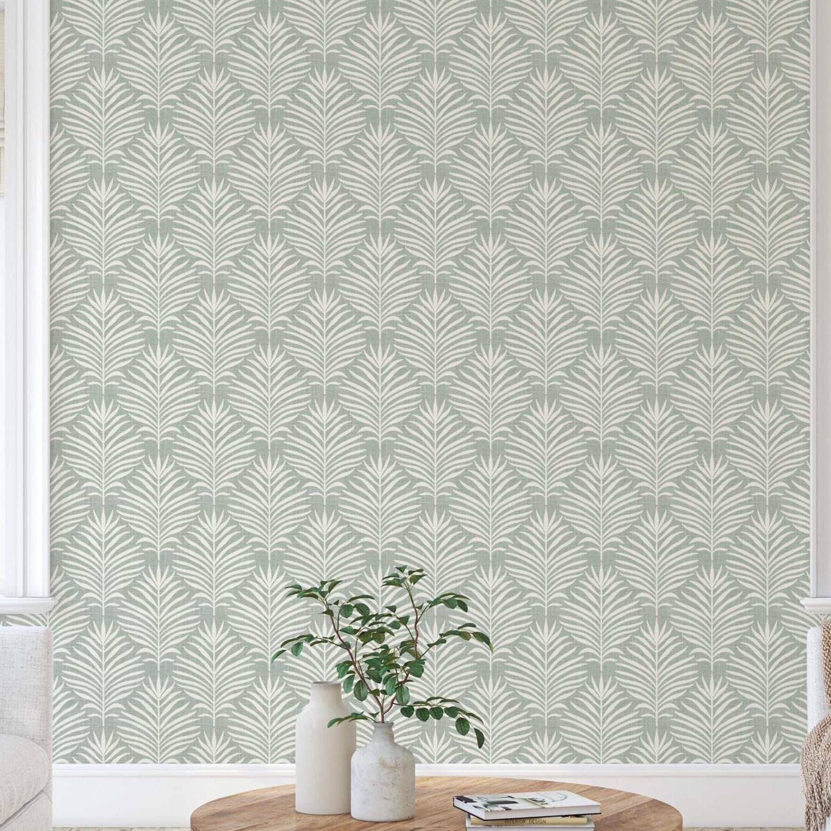 Boho Tropical Peel and Stick Wallpaper shown in peel and stick or pre-pasted. Neutral Blue Green Botanical Palm Leaf perfect for Modern Coastal interiors, baby nursery, bathroom or powder room.