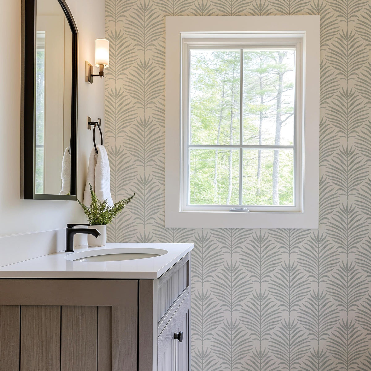 tropical boho wallpaper with minimalist gray and off white palm leaf print. shown in removable peel and stick or prepasted. Perfect for modern coastal bathroom, baby nursery, powder room, entry, dining, office, or living room accent wall.