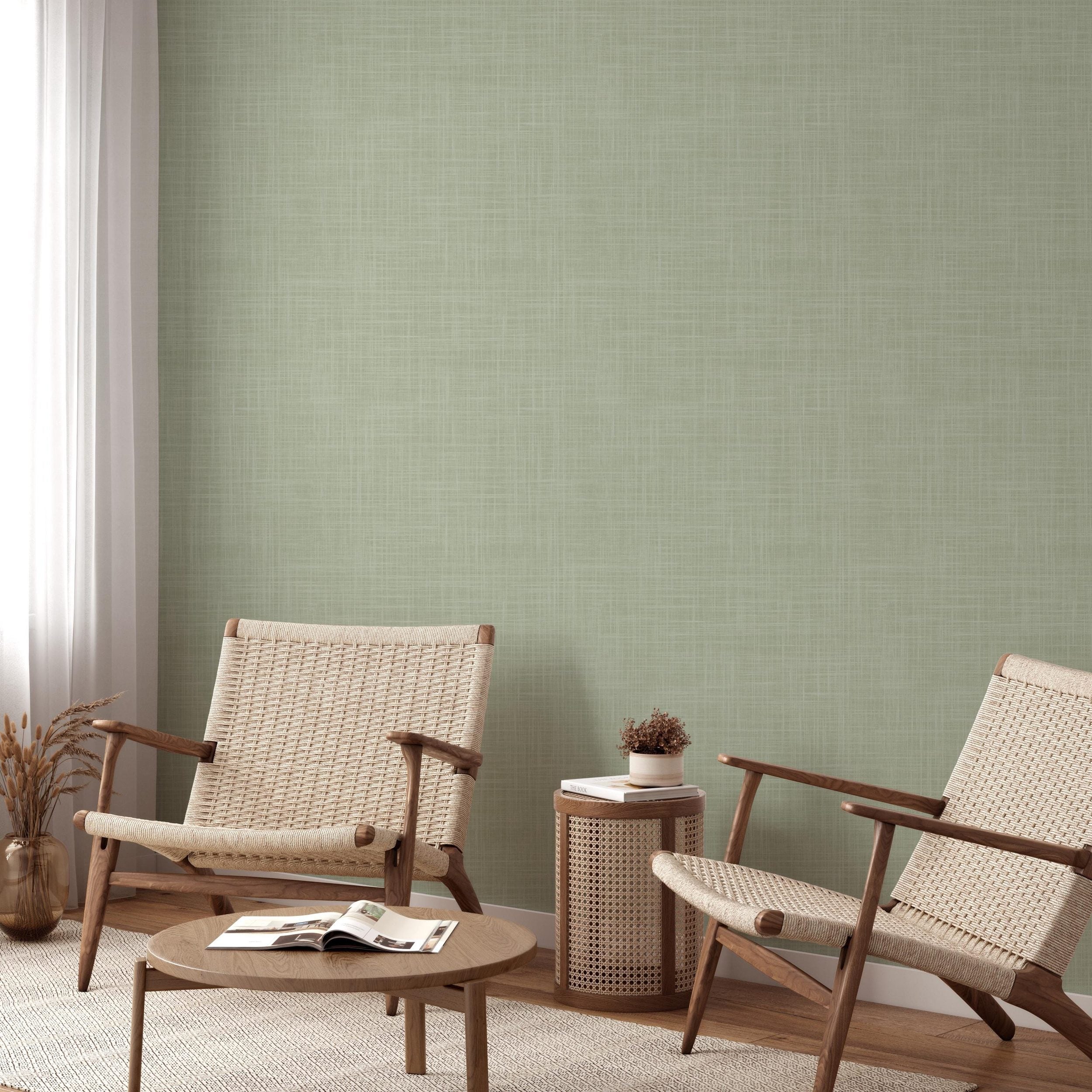 sage green wallpaper showing in peel and stick or prepasted temporary removable with linen look texture for Japandi, boho and farmhouse nursery, powder room, dining room, bedroom, laundry room or office walls.