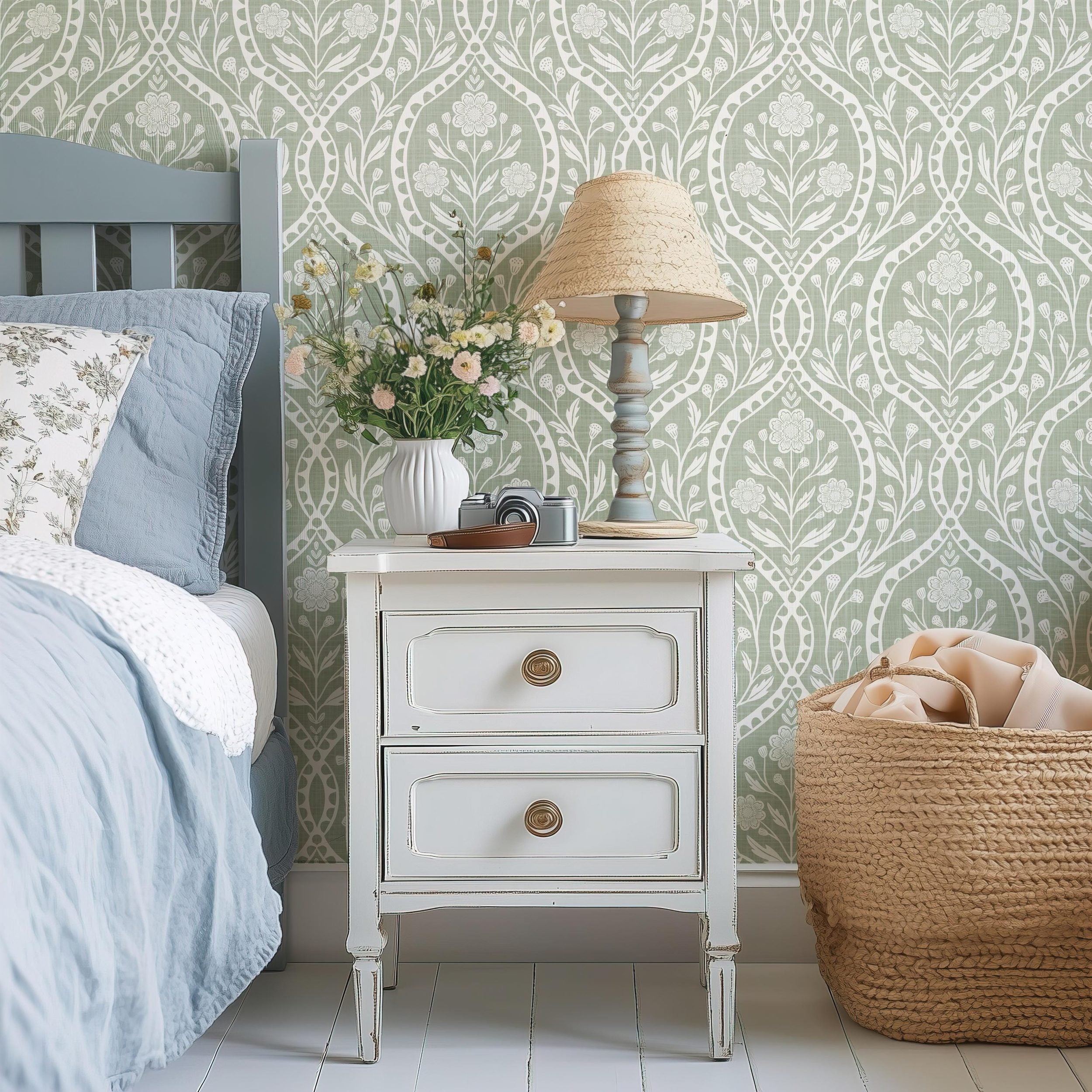 Sage green and white floral wallpaper with a wildflower floral damask pattern. Shown in peel and stick or prepasted for a removable renter friendly option for traditional or french country aesthetic suitable for baby nursery, bedroom, bathroom, kitchen or dining room.