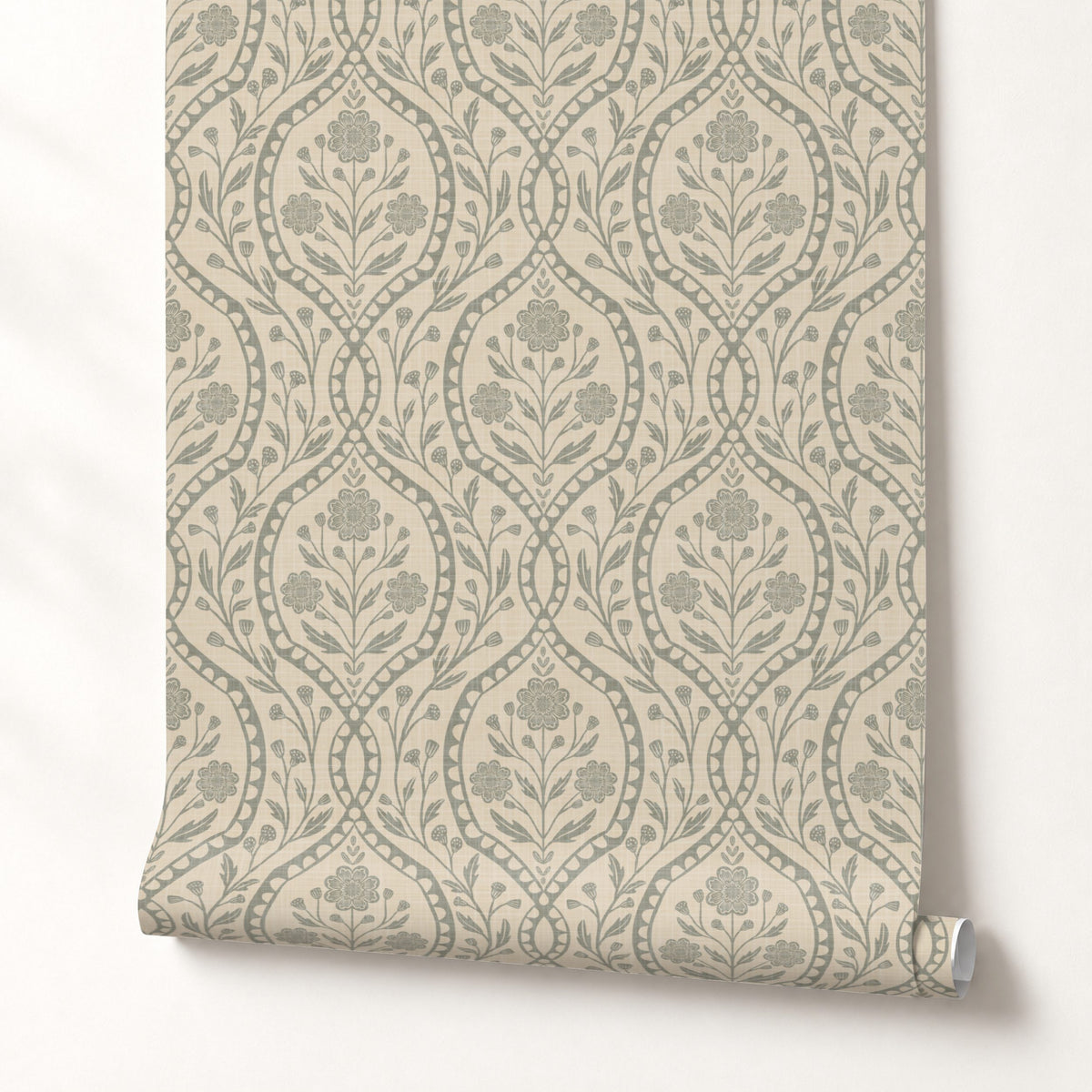 wallpaper shown in peel and stick or removable prepasted. neutral sage green and beige French country wallpaper with elegant wildflower damask. Renter-friendly subtle botanical design for a timeless baby girl nursery, bedroom, or bathroom wall.