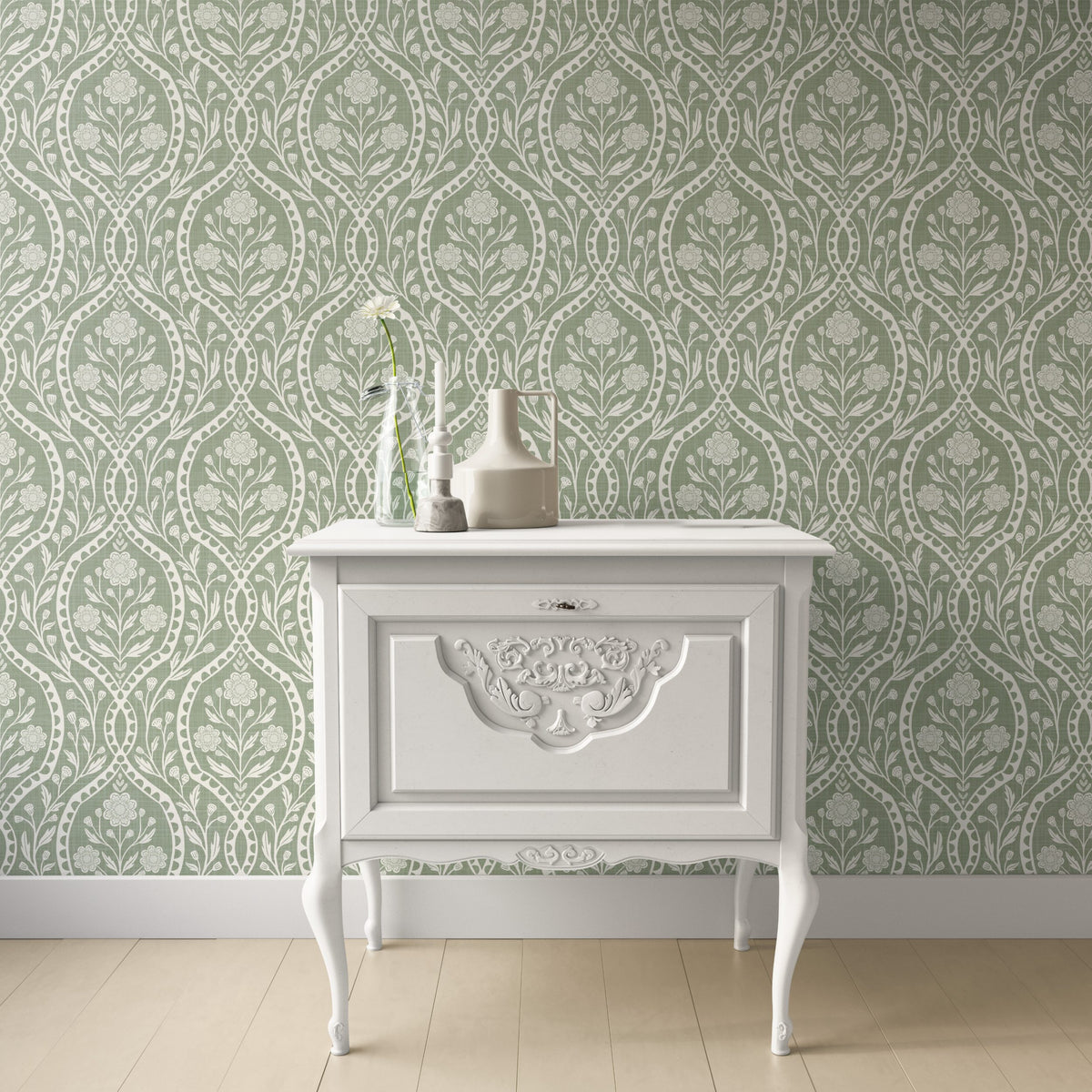Sage green and white floral wallpaper with a wildflower floral damask pattern. Shown in peel and stick or prepasted for a removable renter friendly option for traditional or french country aesthetic suitable for baby nursery, bedroom, bathroom, kitchen or dining room.