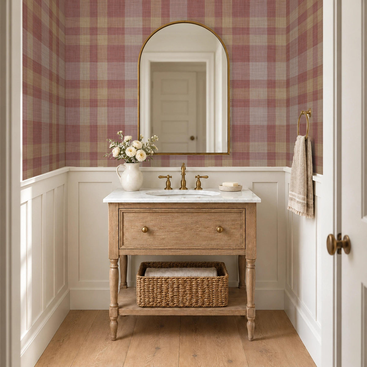 Burgundy plaid wallpaper above wainscoting in a powder room