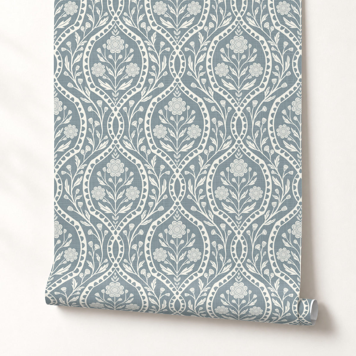 blue and white floral wallpaper with a wildflower floral damask pattern. Shown in peel and stick or prepasted for a removable renter friendly option for traditional or french country aesthetic suitable for baby nursery, bedroom, bathroom, kitchen or dining room.