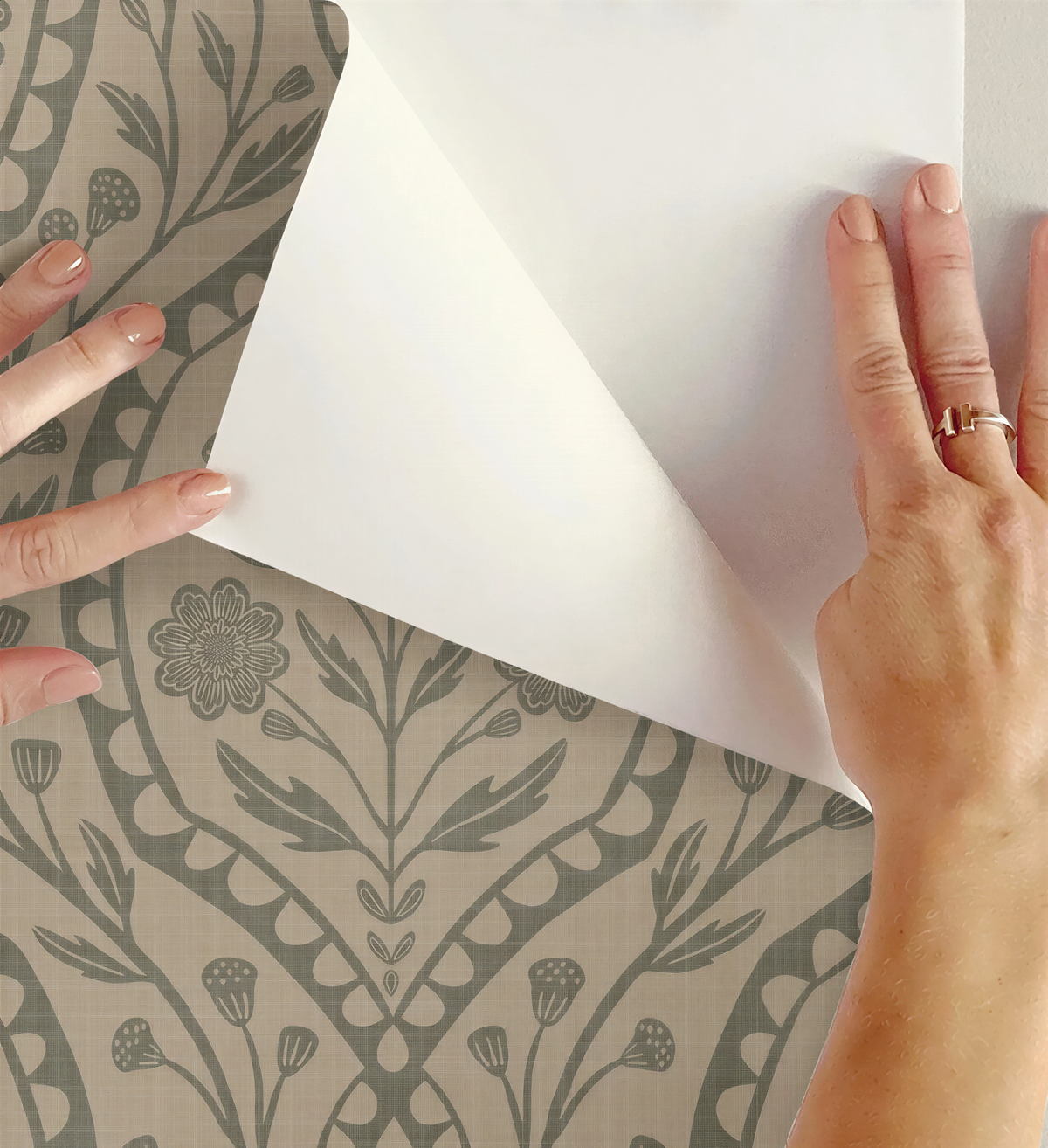 wallpaper shown in peel and stick or removable prepasted. neutral sage green and beige French country wallpaper with elegant wildflower damask. Renter-friendly subtle botanical design for a timeless baby girl nursery, bedroom, or bathroom wall.
