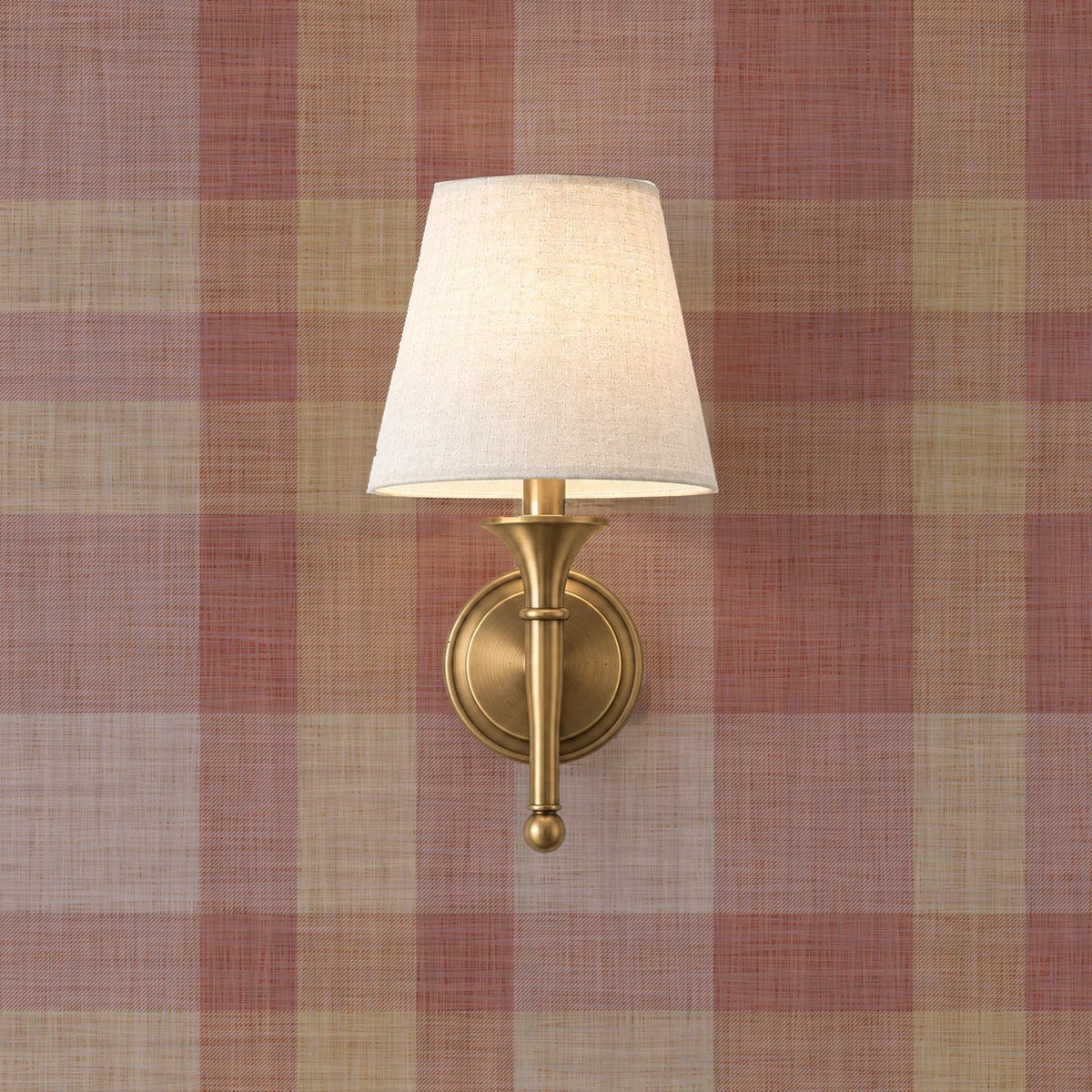 Brass wall sconce on Hollis Plaid wallpaper in burgundy and taupe