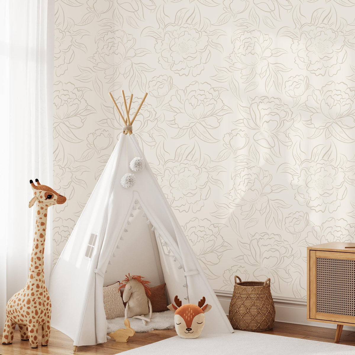 Playroom with a teepee and toy giraffe against neutral Peony Sketch floral wallpaper