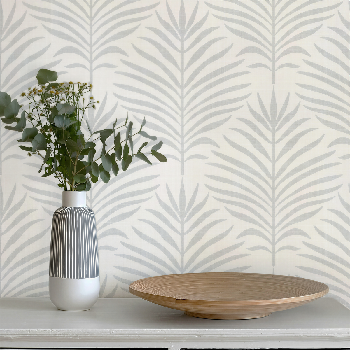 coastal botanical palm leaf wallpaper in gray and white for modern beach house or tropical decor in peel and stick, prepasted, or traditional nonpasted samples and rolls or panels