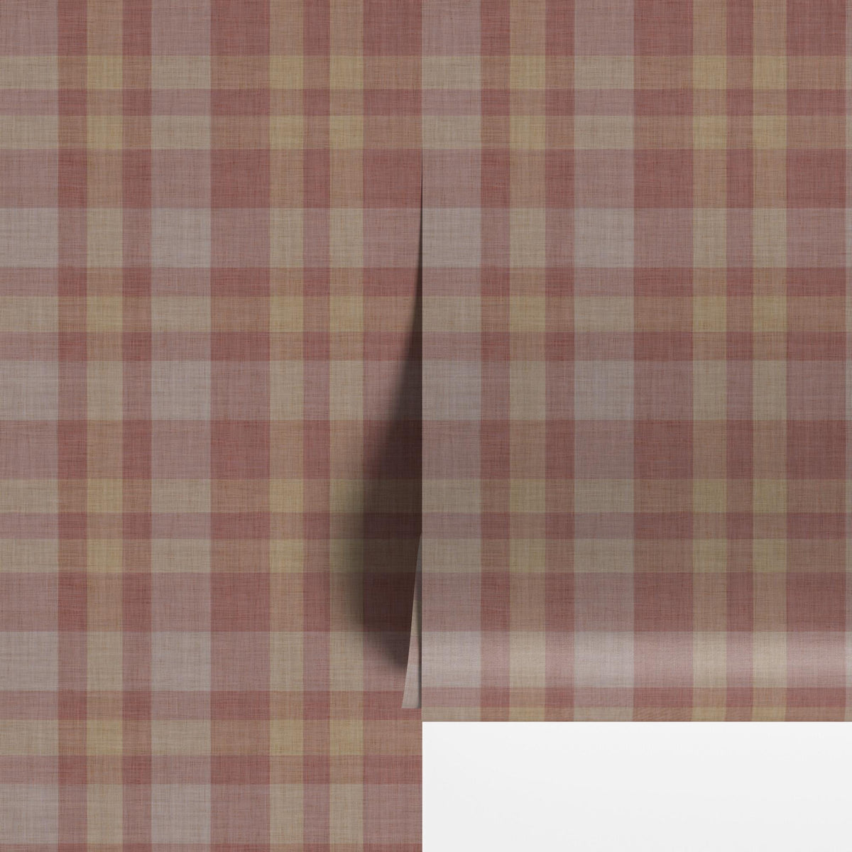Burgundy plaid peel and stick wallpaper panel with the corner lifted