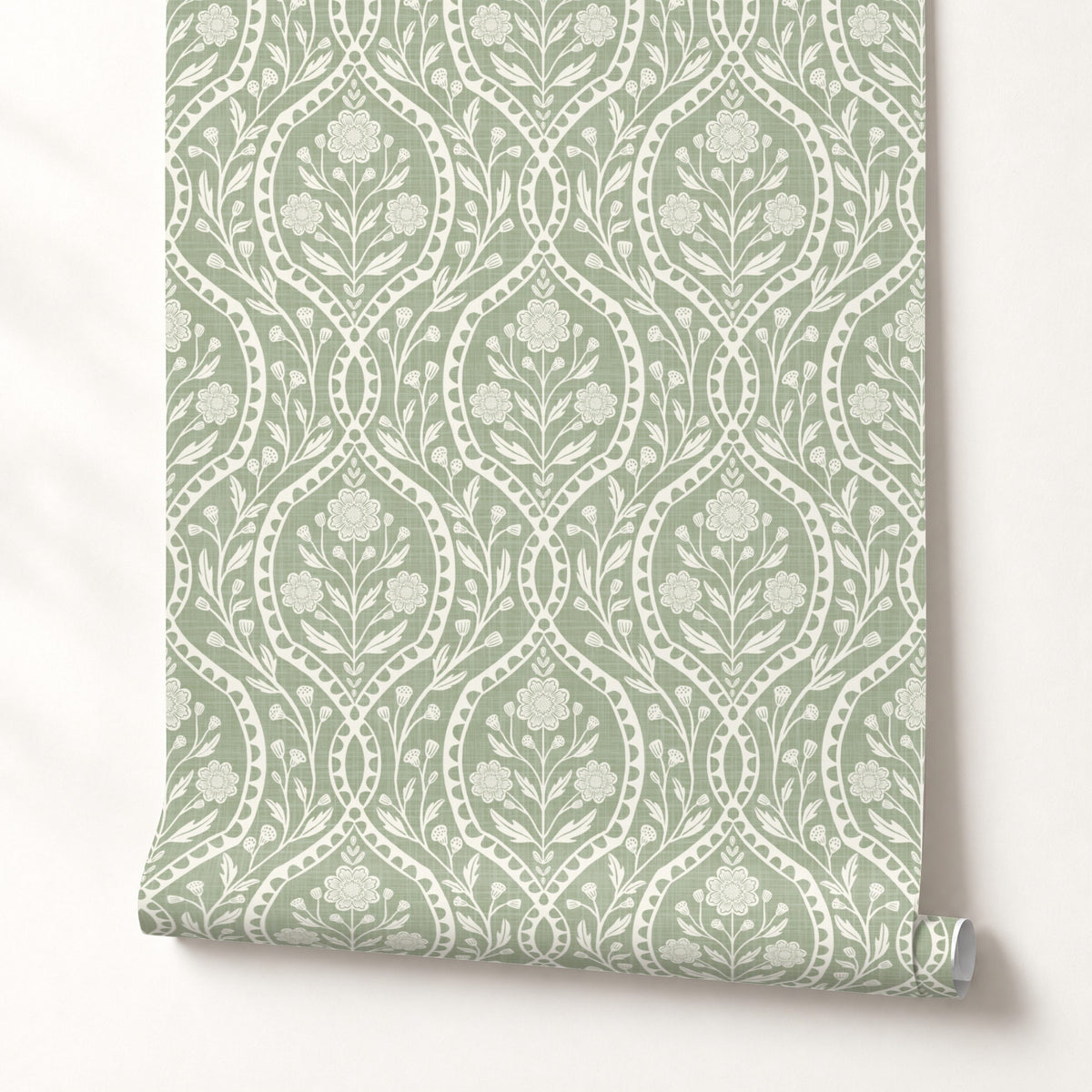 Sage green and white floral wallpaper with a wildflower floral damask pattern. Shown in peel and stick or prepasted for a removable renter friendly option for traditional or french country aesthetic suitable for baby nursery, bedroom, bathroom, kitchen or dining room.
