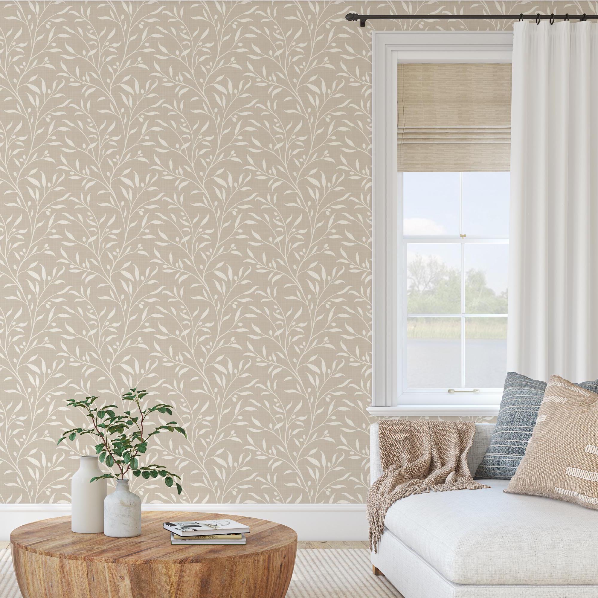 a cozy living room with a white sofa, a wooden coffee table, and a window with a beige curtain. The room has a neutral color palette with a patterned wallpaper and a beige color scheme.