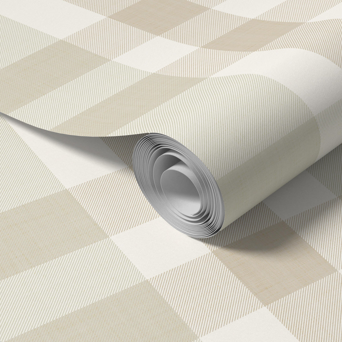 Close-up of a rolled panel of beige and cream Hollis plaid wallpaper