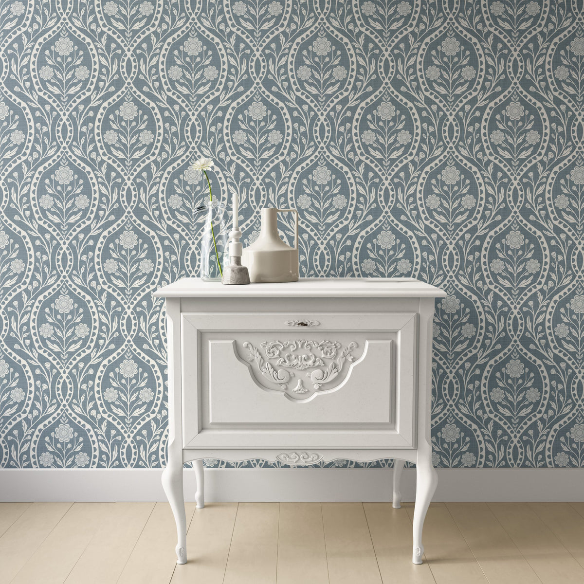 blue and white floral wallpaper with a wildflower floral damask pattern. Shown in peel and stick or prepasted for a removable renter friendly option for traditional or french country aesthetic suitable for baby nursery, bedroom, bathroom, kitchen or dining room.