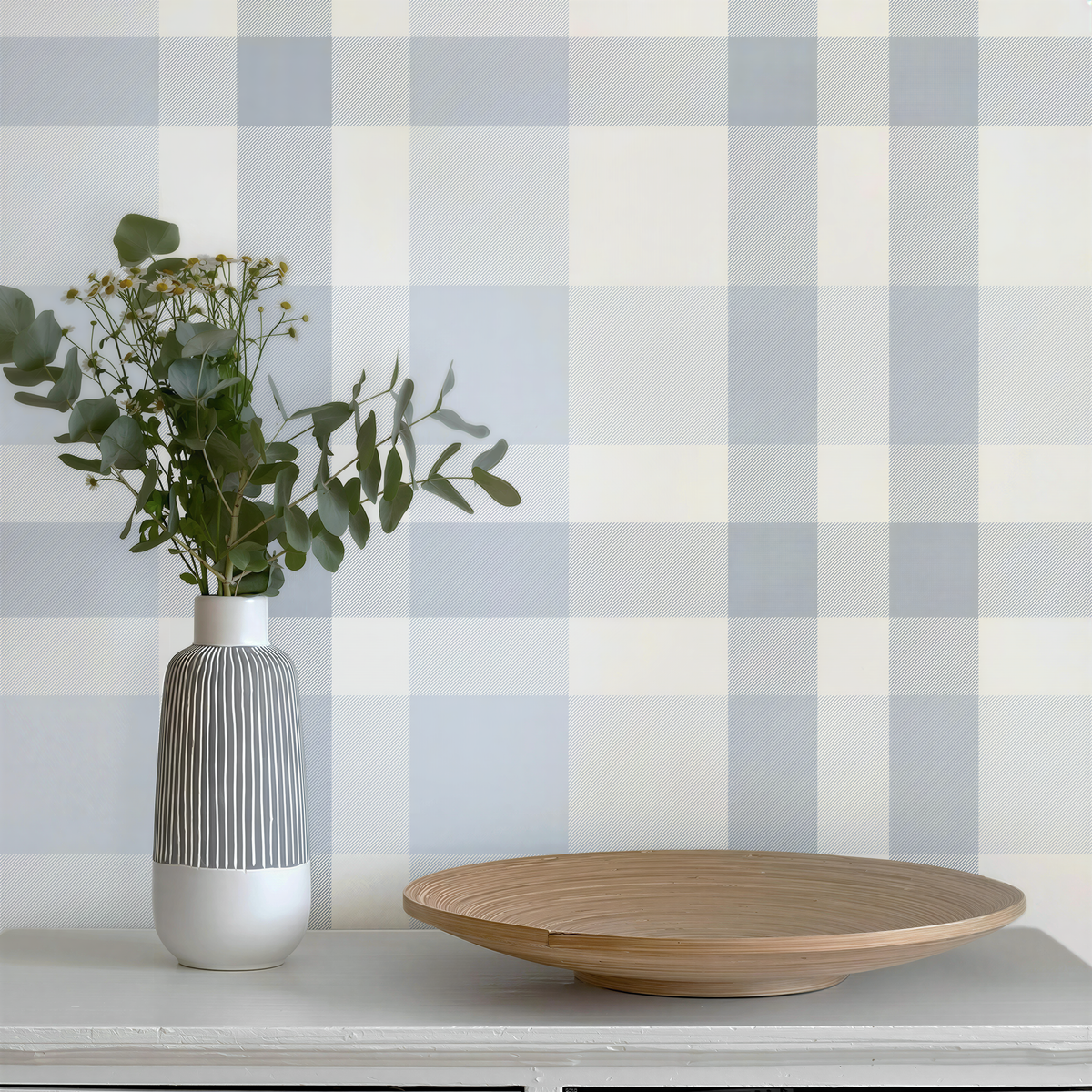 Blue and white plaid wallpaper accent wall in a coastal cottage home