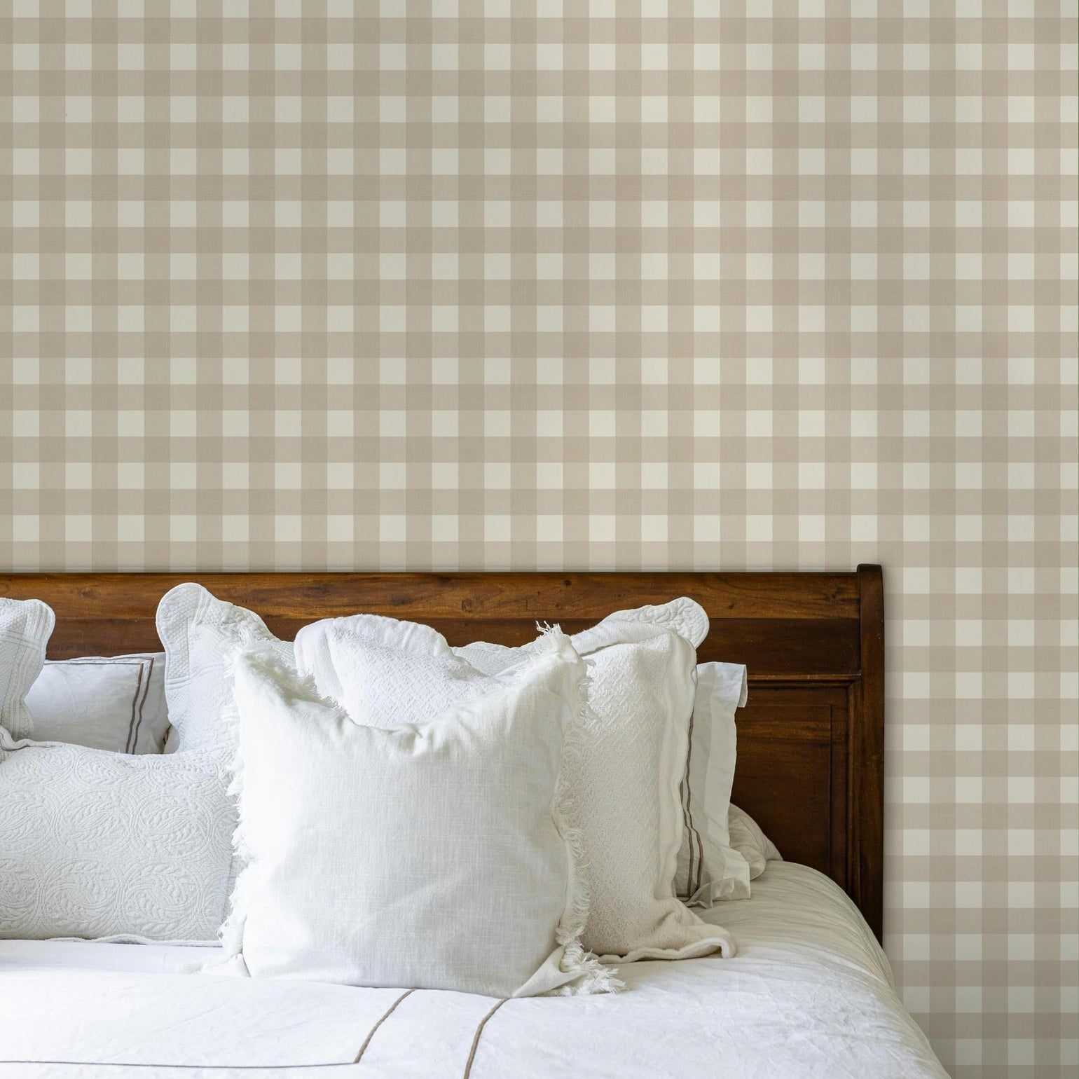 shown as bedroom accent wall, this Beige and taupe gingham wallpaper, also known as buffalo check or buffalo plaid. Designed with a soft linen texture and warm neutral tones, perfect for cottagecore, boho, or farmhouse interiors. A cozy choice for boys’ nurseries, gender-neutral kids’ rooms, kitchens, or entryways. This removable wallpaper is eco-friendly, made in the USA, and created by an independent artist—ideal for renter-friendly accent walls and stylish DIY home projects.