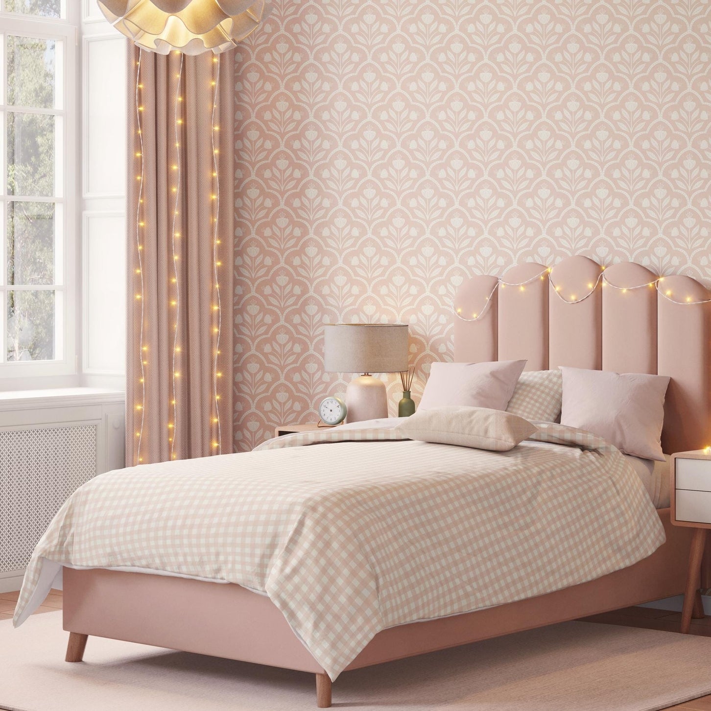 Pastel pink floral wallpaper with a repeating wildflower pattern in a soft coquette style, ideal for baby girl nurseries, tween rooms, or romantic accent walls. featured on girls bedroom wall for kids, teens or tweens