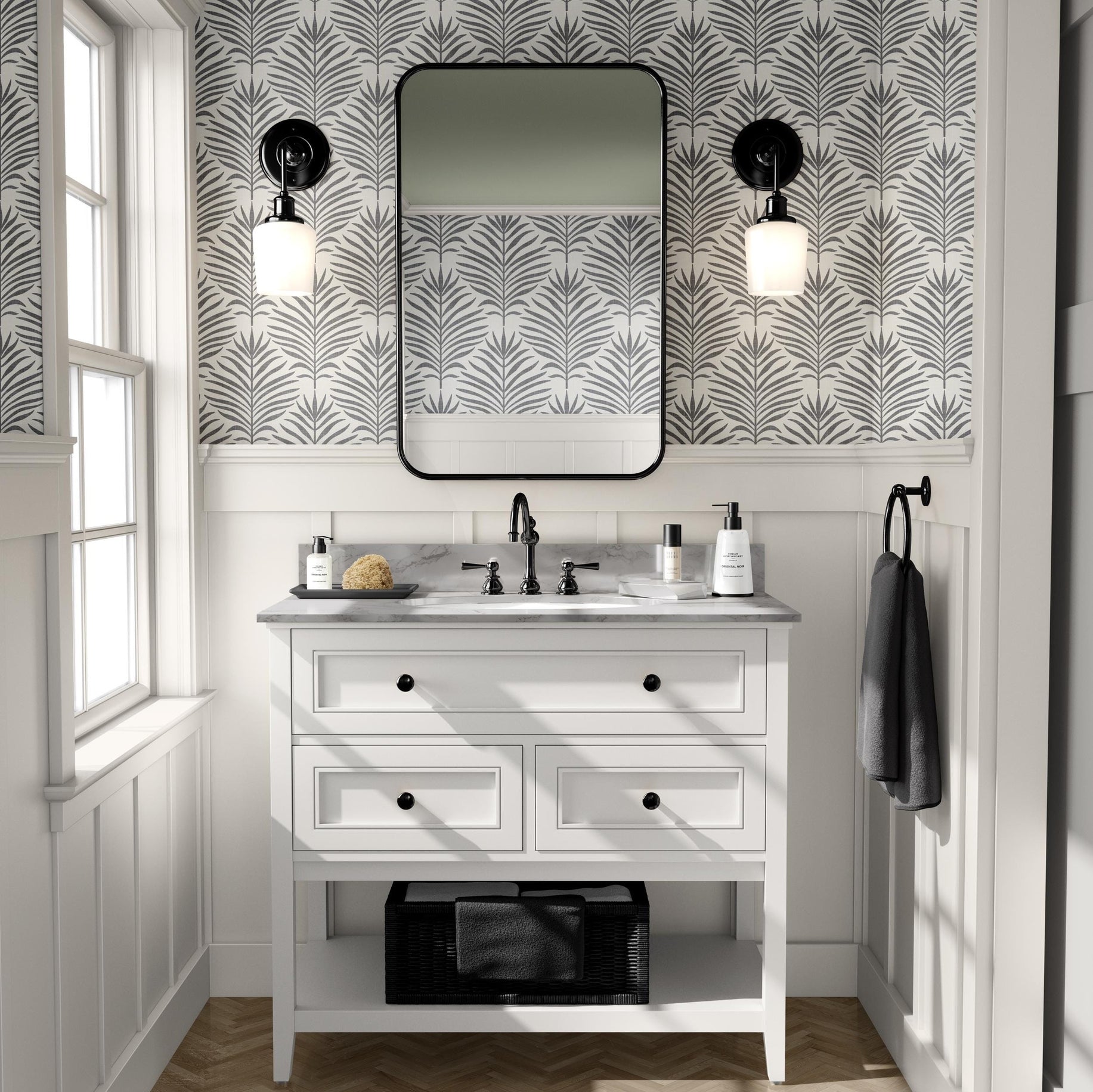 Neutral charcoal black and white palm leaf wallpaper available in peel and stick and prepasted in a modern tropical boho style with a subtle linen texture, ideal for coastal bedrooms, powder rooms, or modern accent walls. featured as bathroom accent wall.