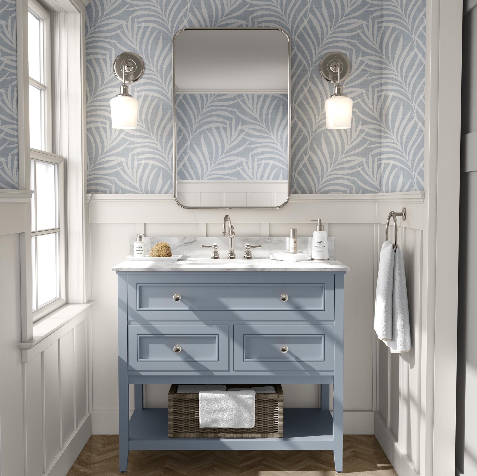 tropical boho palm leaf wallpaper in soft calm blue and white shown in removable peel and stick or prepasted. Perfect for modern coastal bathroom, powder room, nursery or laundry room accent wall.