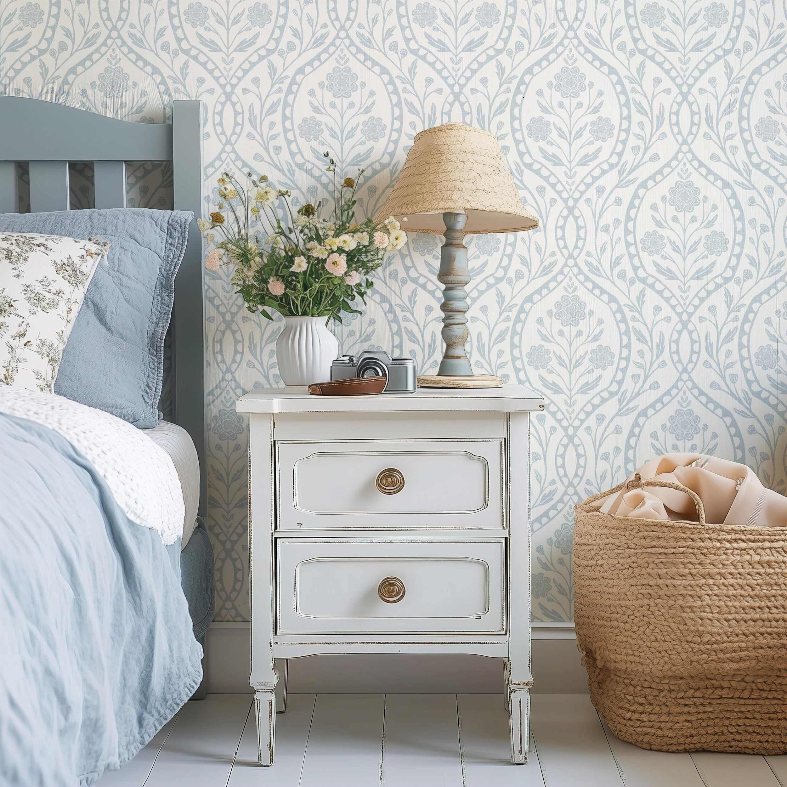 Light blue French country wallpaper with elegant wildflowers on an off-white background. Renter-friendly design for nursery, bedroom, or bathroom wall.
