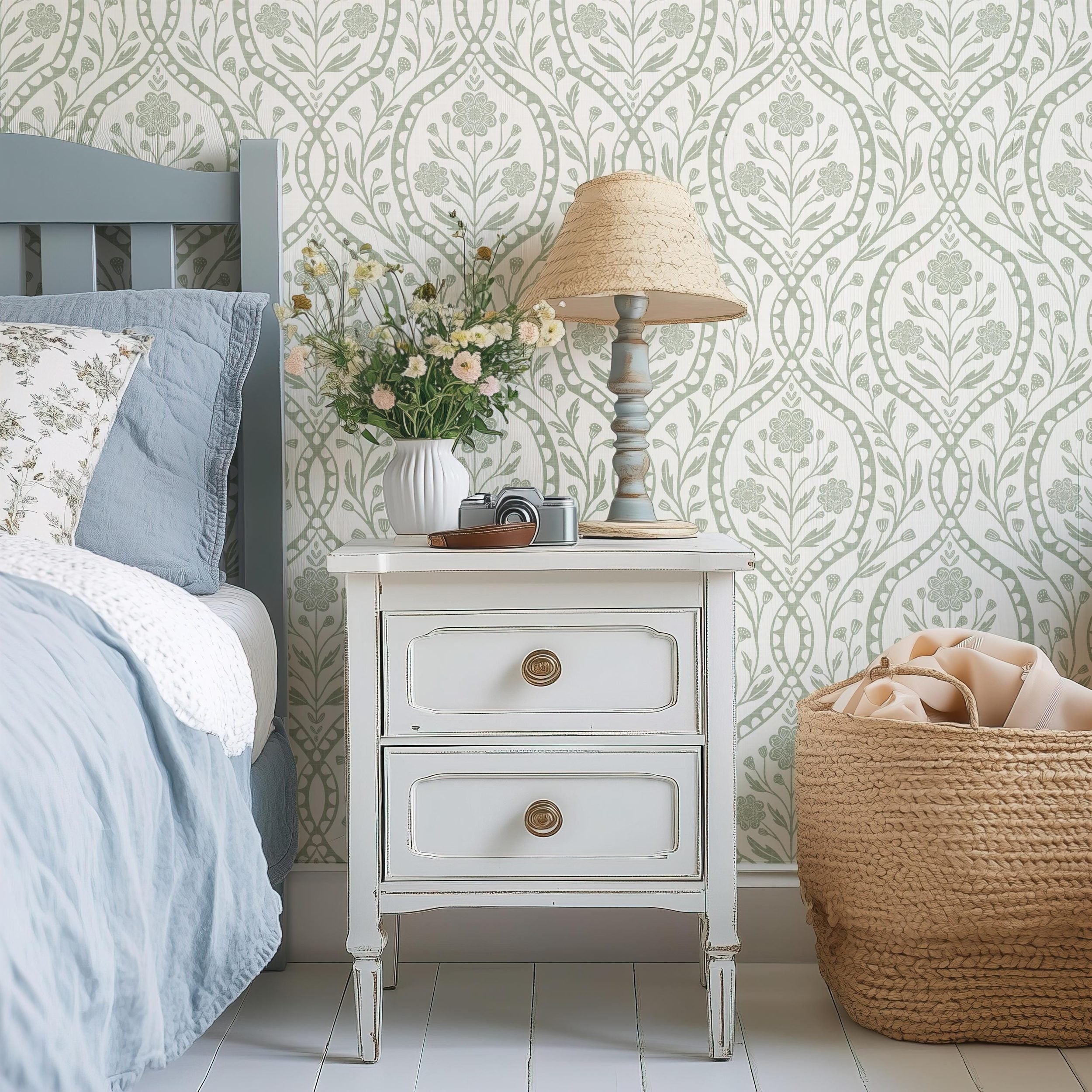 Sage green and white floral wallpaper with a wildflower floral damask pattern. Shown in peel and stick or prepasted for a removable renter friendly option for traditional or french country aesthetic suitable for baby nursery, bedroom, bathroom, kitchen or dining room.