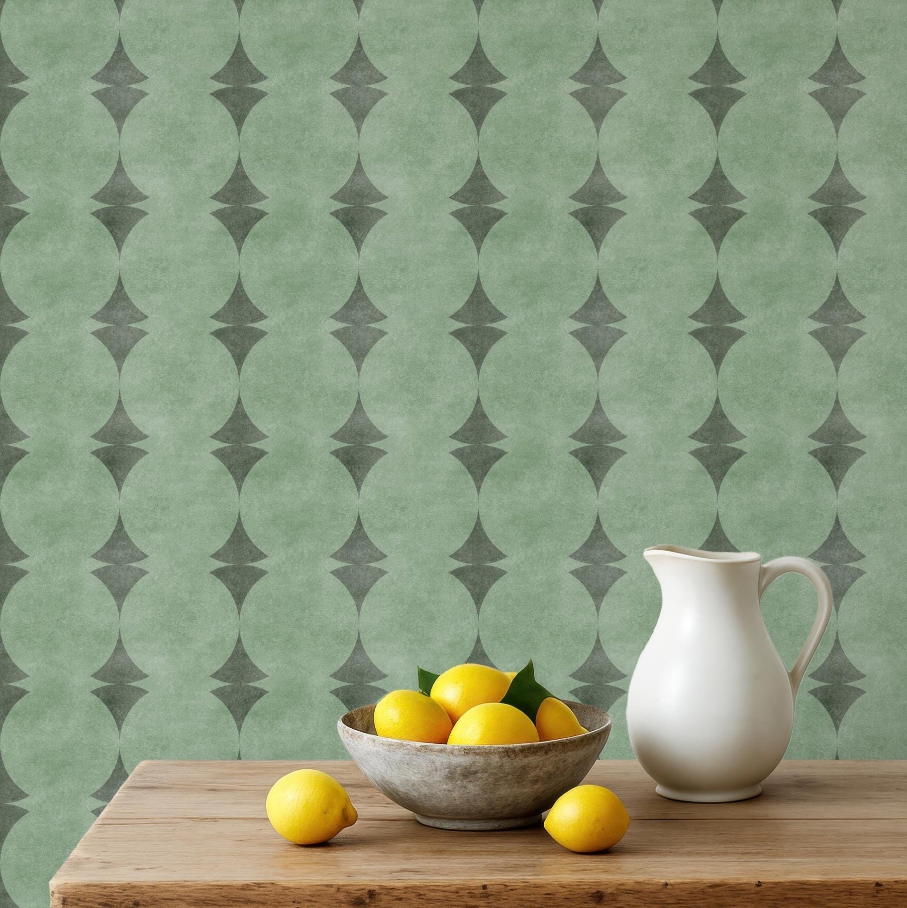 Sage green peel and stick or prepasted wallpaper with Mediterranean art deco stripe pattern and subtle stone texture, shown styled in a kitchen backsplash. Ideal for coastal homes, powder rooms, rentals, kitchens, and DIY accent walls.