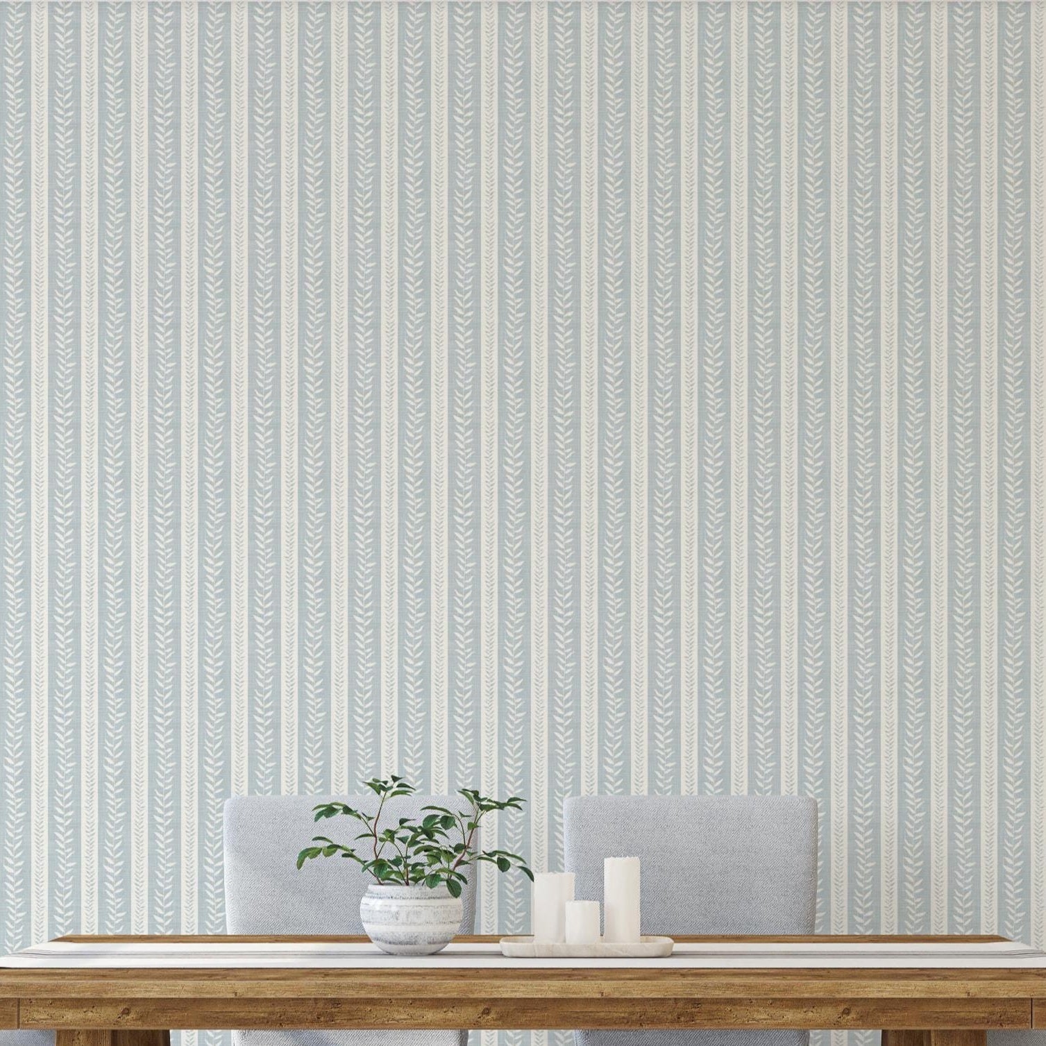 wallpaper peel and stick or prepasted in light blue and white botanical stripe for modern coastal farmhouse and french country interiors. Perfect for bathroom, powder room, or baby nursery accent walls. Light faux linen texture with tropical vine stripe for a timeless look.