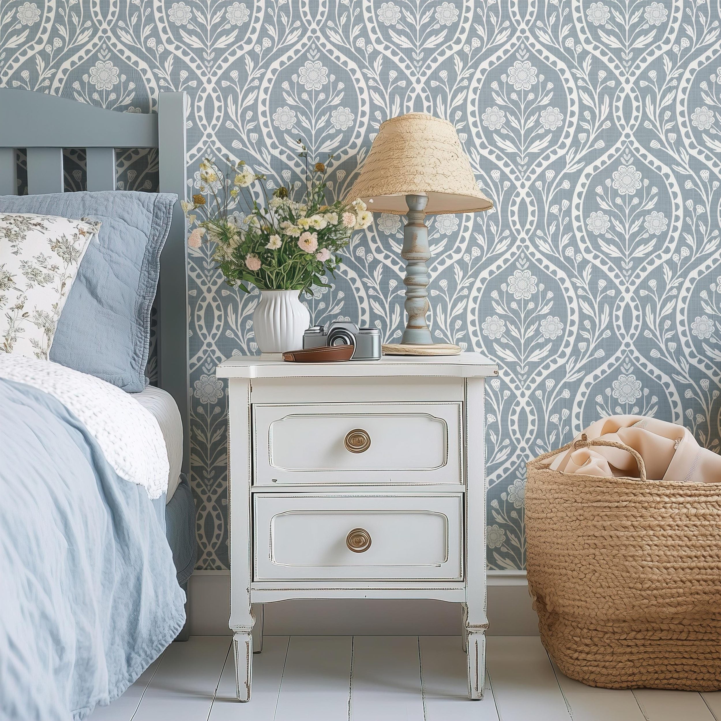 blue and white floral wallpaper with a wildflower floral damask pattern. Shown in peel and stick or prepasted for a removable renter friendly option for traditional or french country aesthetic suitable for baby nursery, bedroom, bathroom, kitchen or dining room.