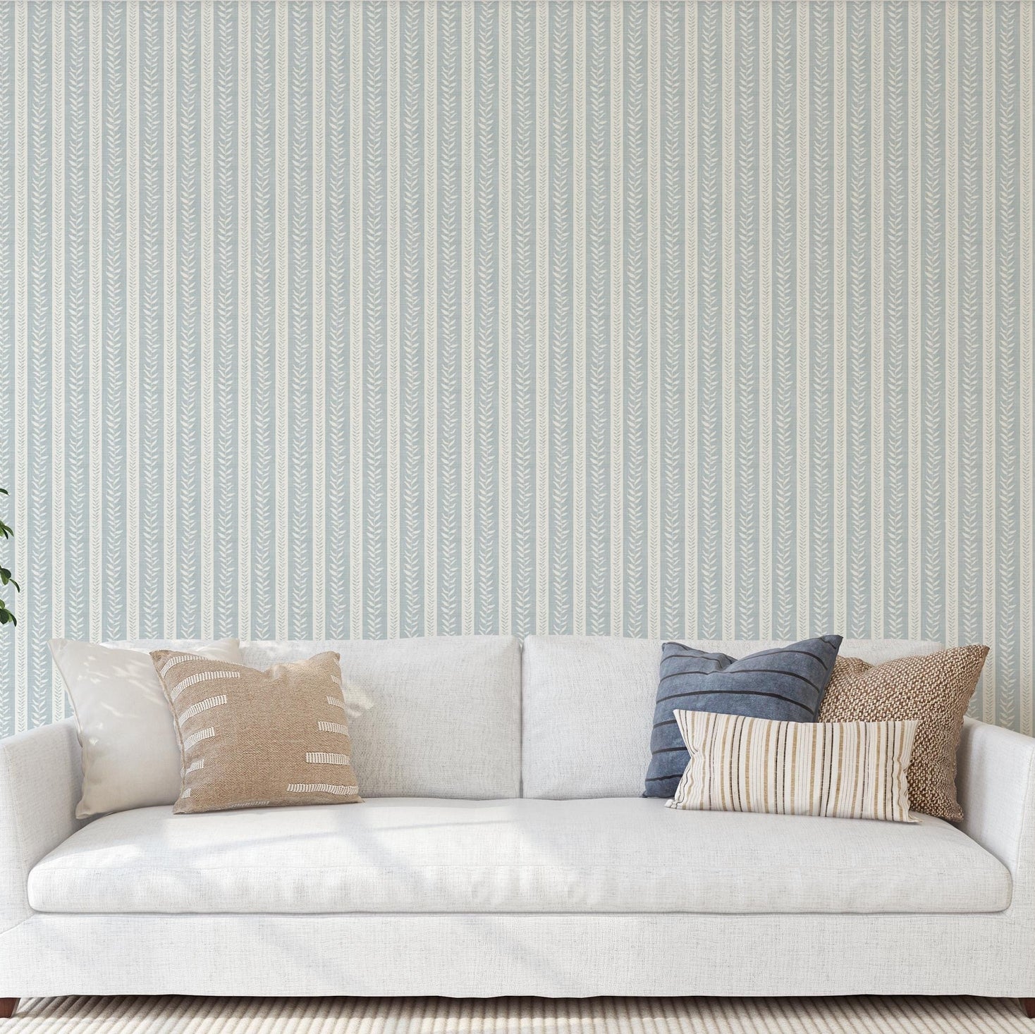 wallpaper peel and stick or prepasted in light blue and white botanical stripe for modern coastal farmhouse and french country interiors. Perfect for bathroom, powder room, or baby nursery accent walls. Light faux linen texture with tropical vine stripe for a timeless look.