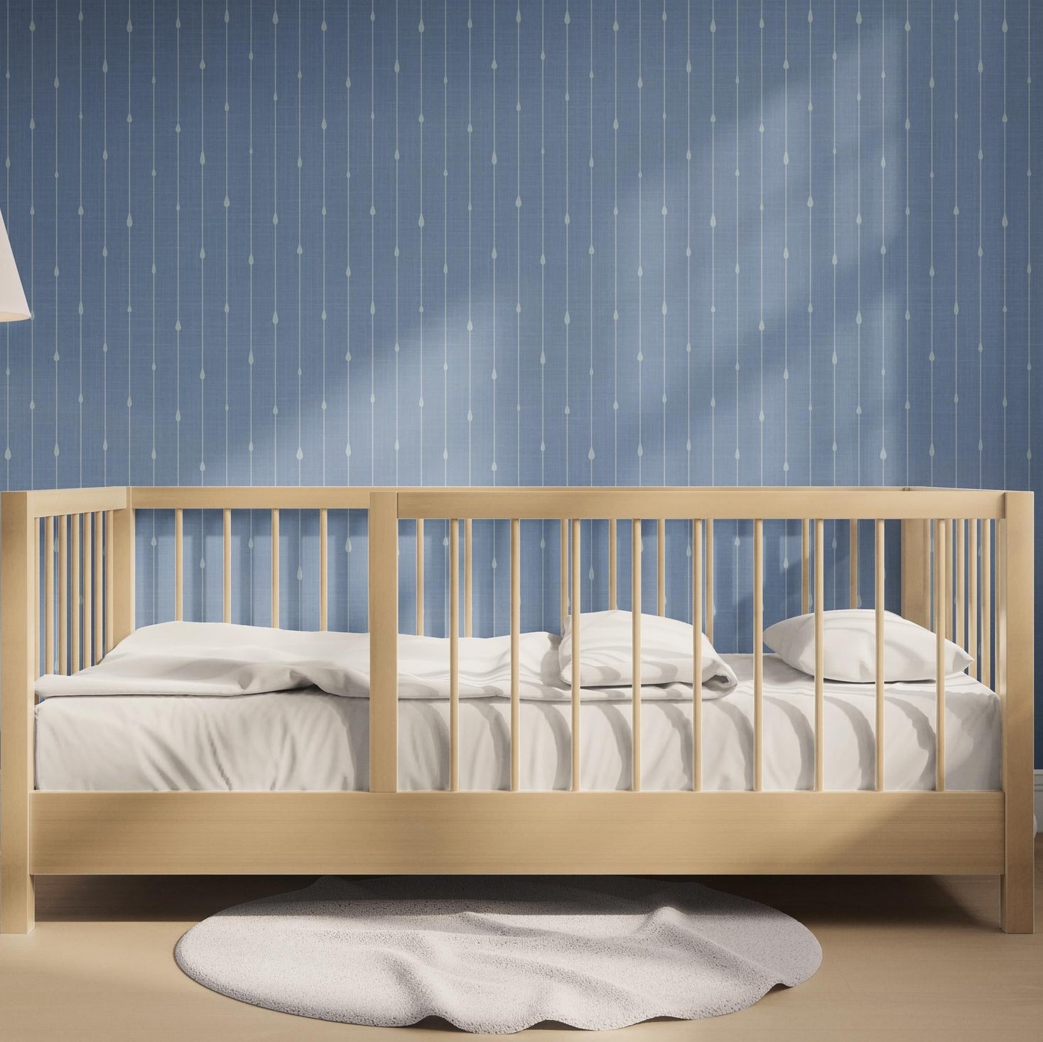 Blue stripe wallpaper for boys ocean nursery, baby boy room, or coastal toddler space. Shown in renter-friendly DIY style, available in peel and stick or prepasted options. Great for bathrooms, powder rooms, accent walls, or nautical baby nursery.