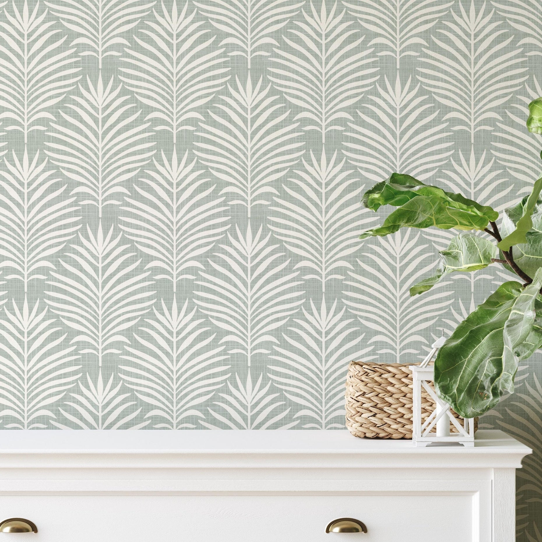 Boho Tropical Peel and Stick Wallpaper shown in peel and stick or pre-pasted. Neutral Blue Green Botanical Palm Leaf perfect for Modern Coastal interiors, baby nursery, bathroom or powder room.