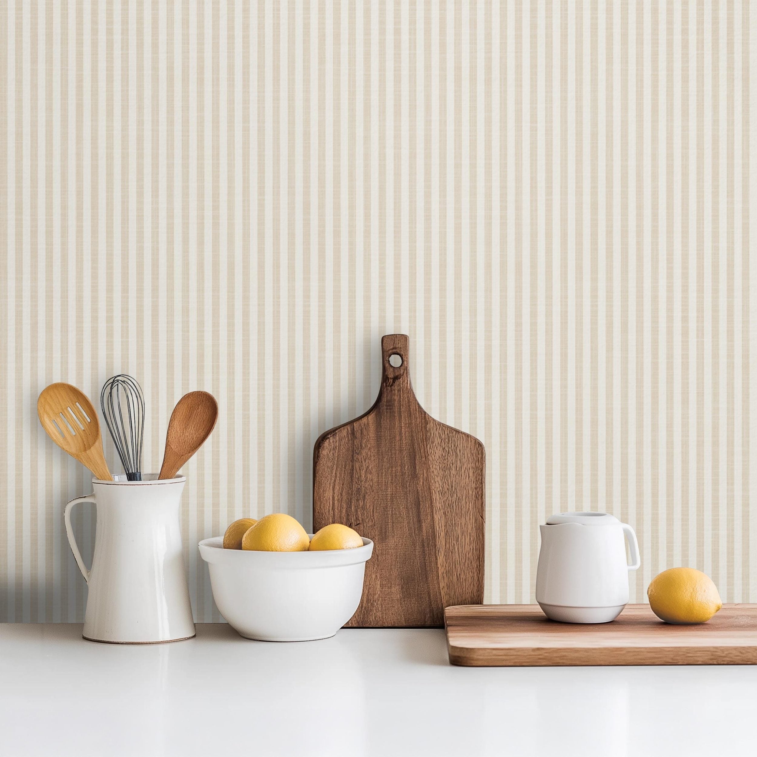 Beige and white vertical stripe wallpaper, minimalist neutral design, shown in renter friendly removable peel and stick or prepasted.