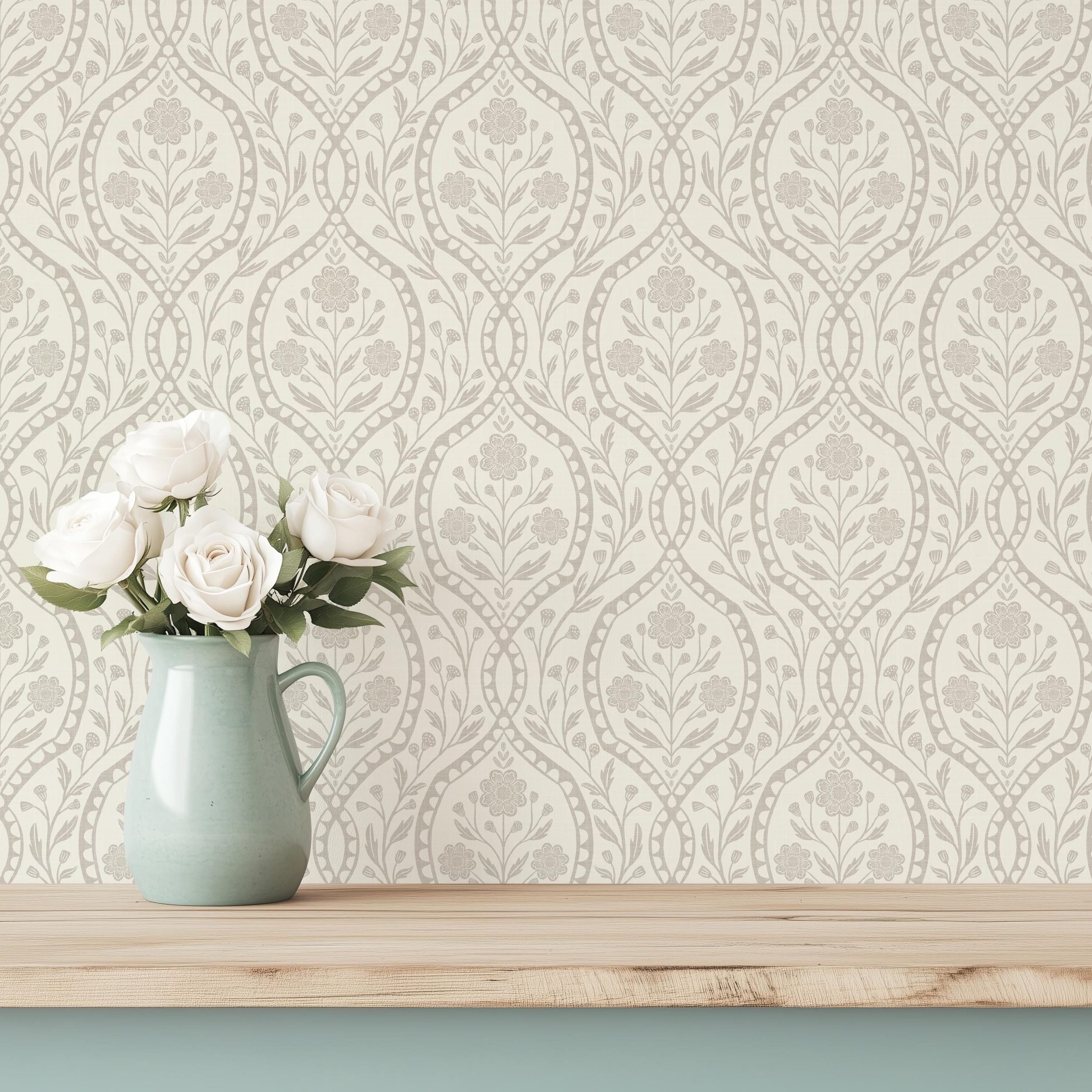 wallpaper shown in peel and stick or removable prepasted. neutral beige and off white French country wallpaper with elegant wildflower damask. Renter-friendly subtle botanical design for a timeless baby girl nursery, bedroom, or bathroom wall.