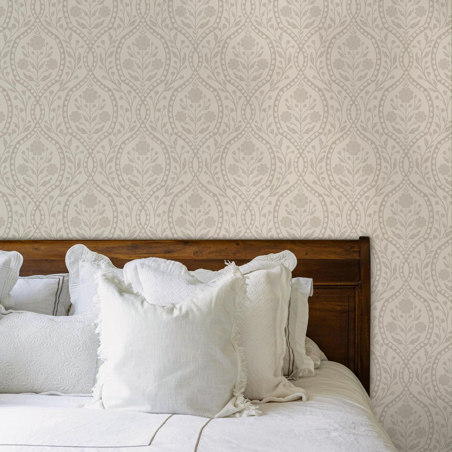 wallpaper shown in peel and stick or removable prepasted. neutral beige and off white French country wallpaper with elegant wildflower damask. Renter-friendly subtle botanical design for a timeless baby girl nursery, bedroom, or bathroom wall.