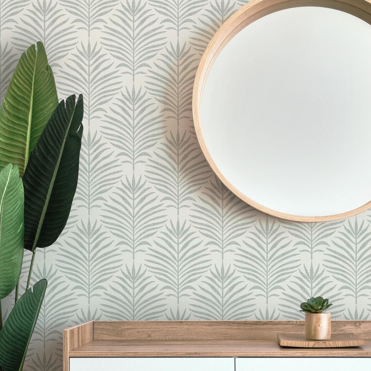 tropical boho wallpaper with minimalist gray and off white palm leaf print. shown in removable peel and stick or prepasted. Perfect for modern coastal bathroom, baby nursery, powder room, entry, dining, office, or living room accent wall.