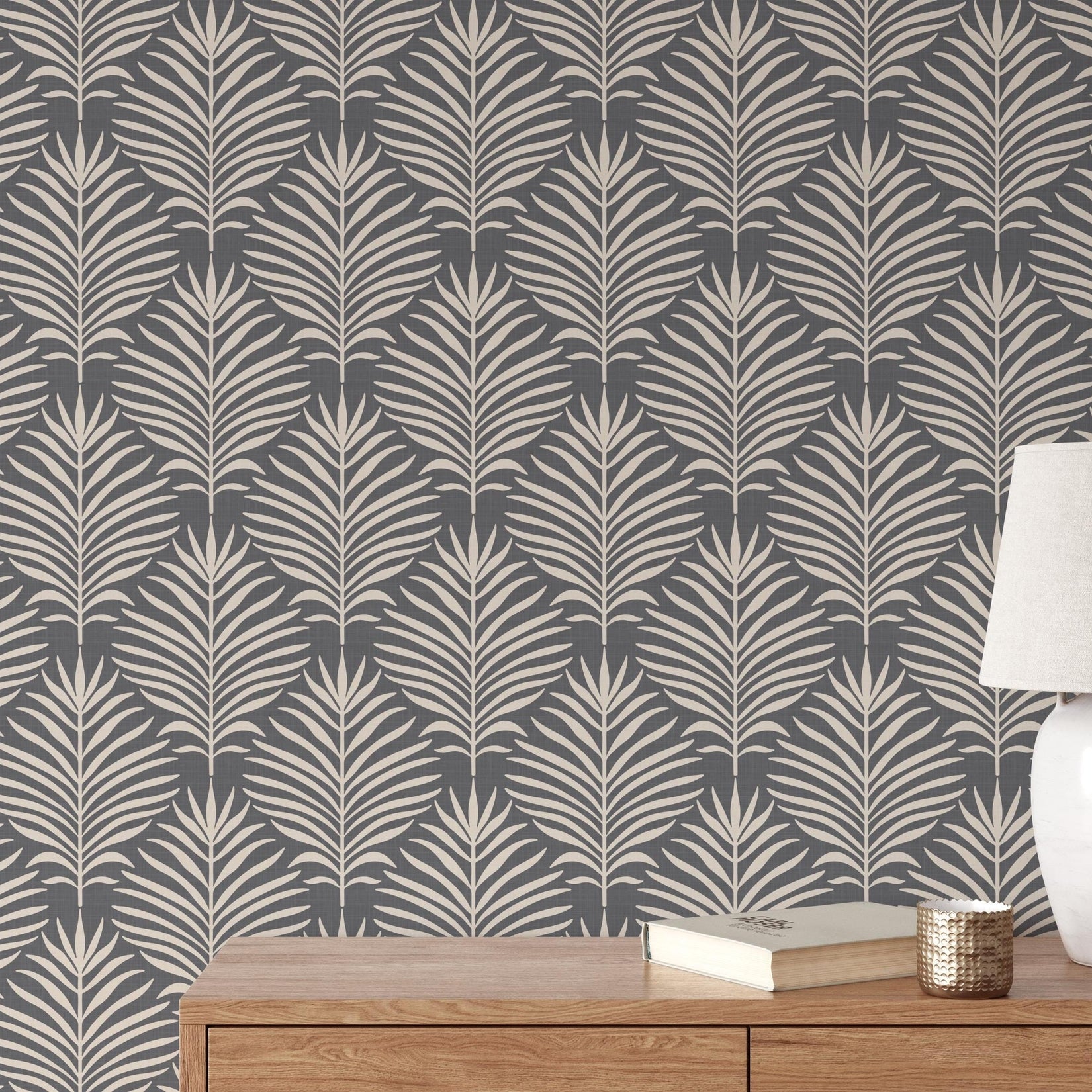 Boho tropical wallpaper shown in peel and stick and prepasted options. Neutral black dark moody botanical palm leaf design for bathroom, powder room, office, living room, dining room, laundry room, and entryway. Renter friendly and removable coastal minimalist look.